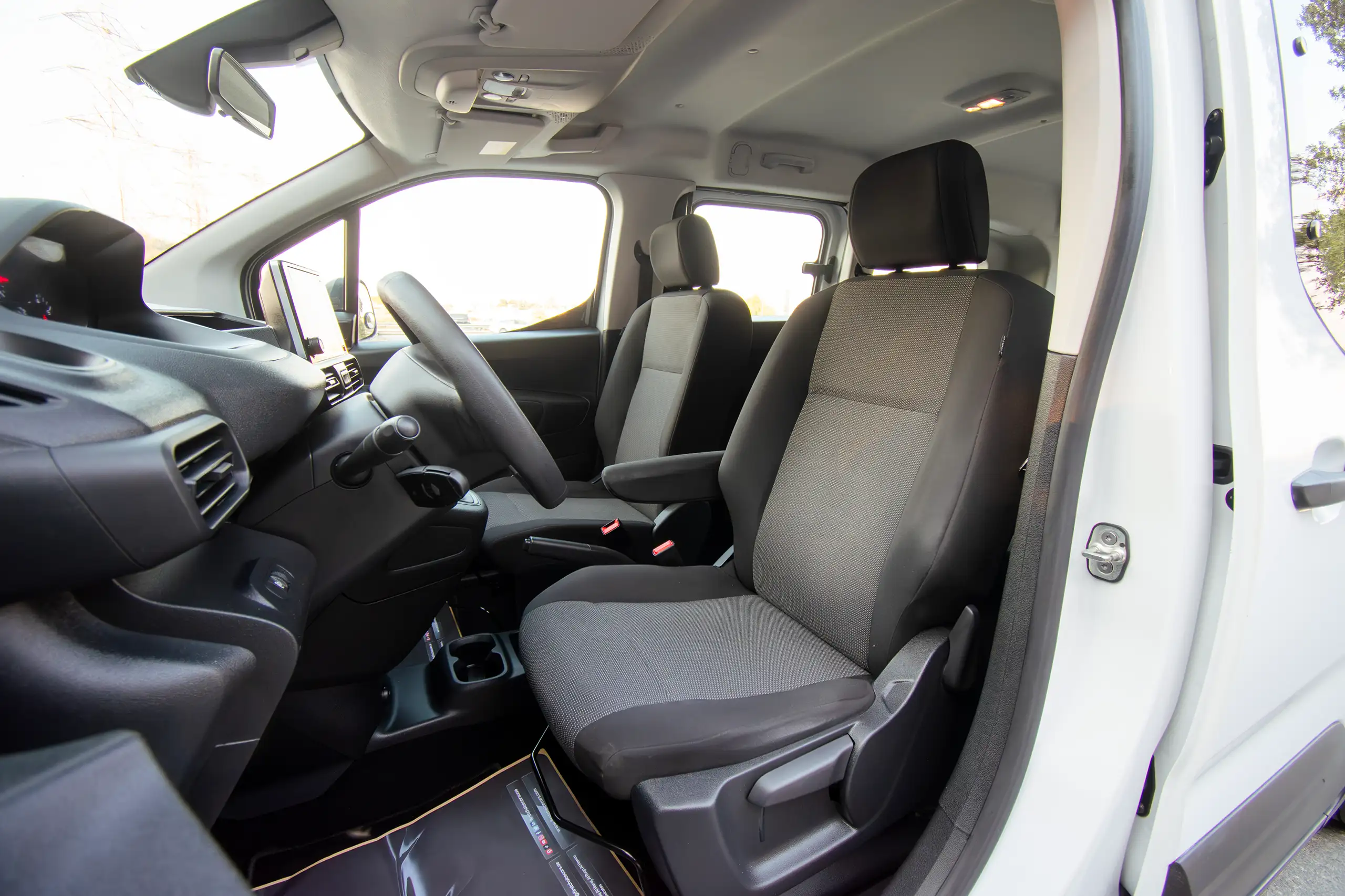 Used 2023 Peugeot Rifter Long White – Front Driver Side Cabin View at First Choice Cars Sharjah