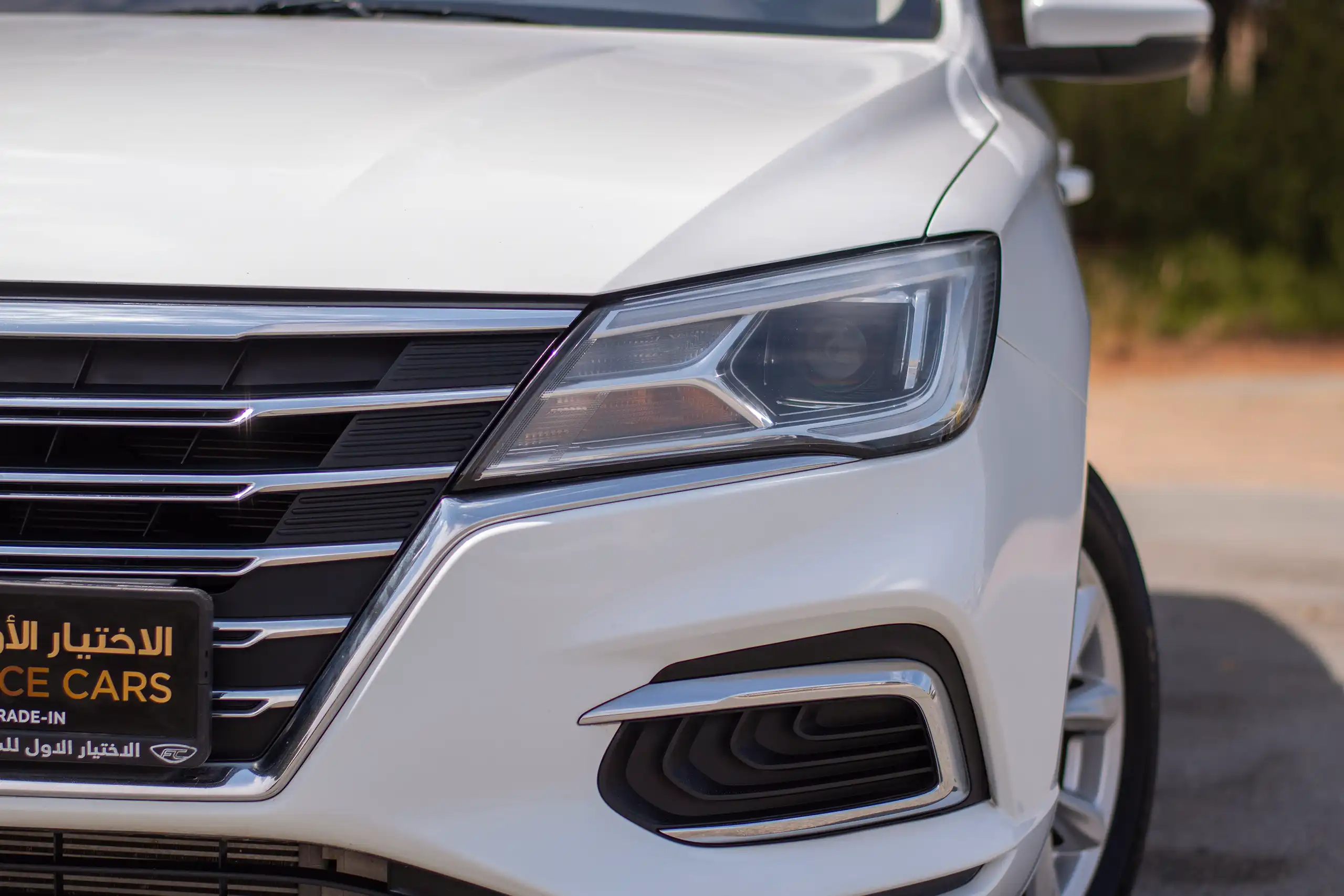 Used 2023 MG 5 Comfort White – Headlight Close-up at First Choice Cars Sharjah