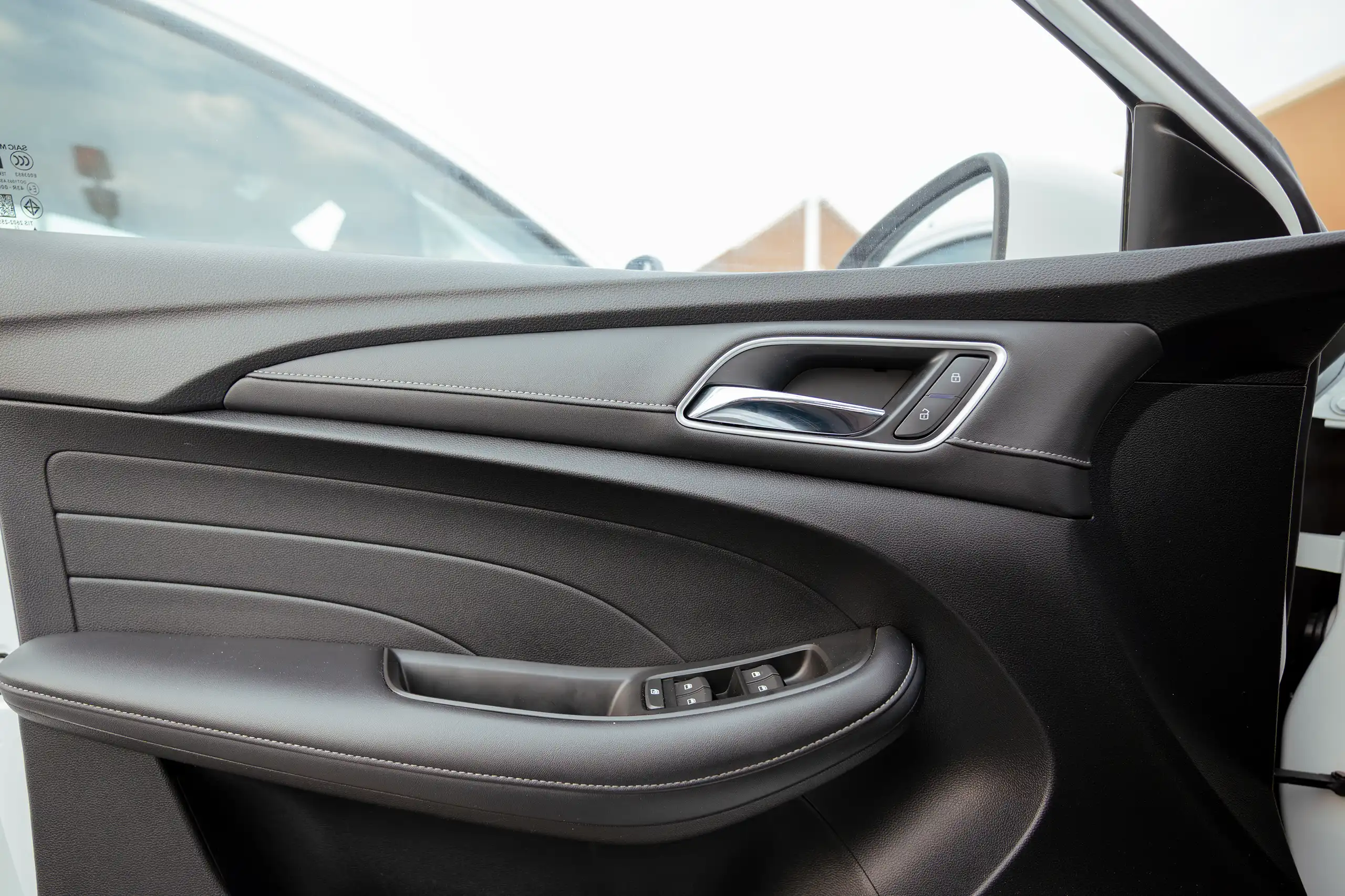 Used 2023 MG 5 Comfort White – Driver Door Panel Full View at First Choice Cars Sharjah