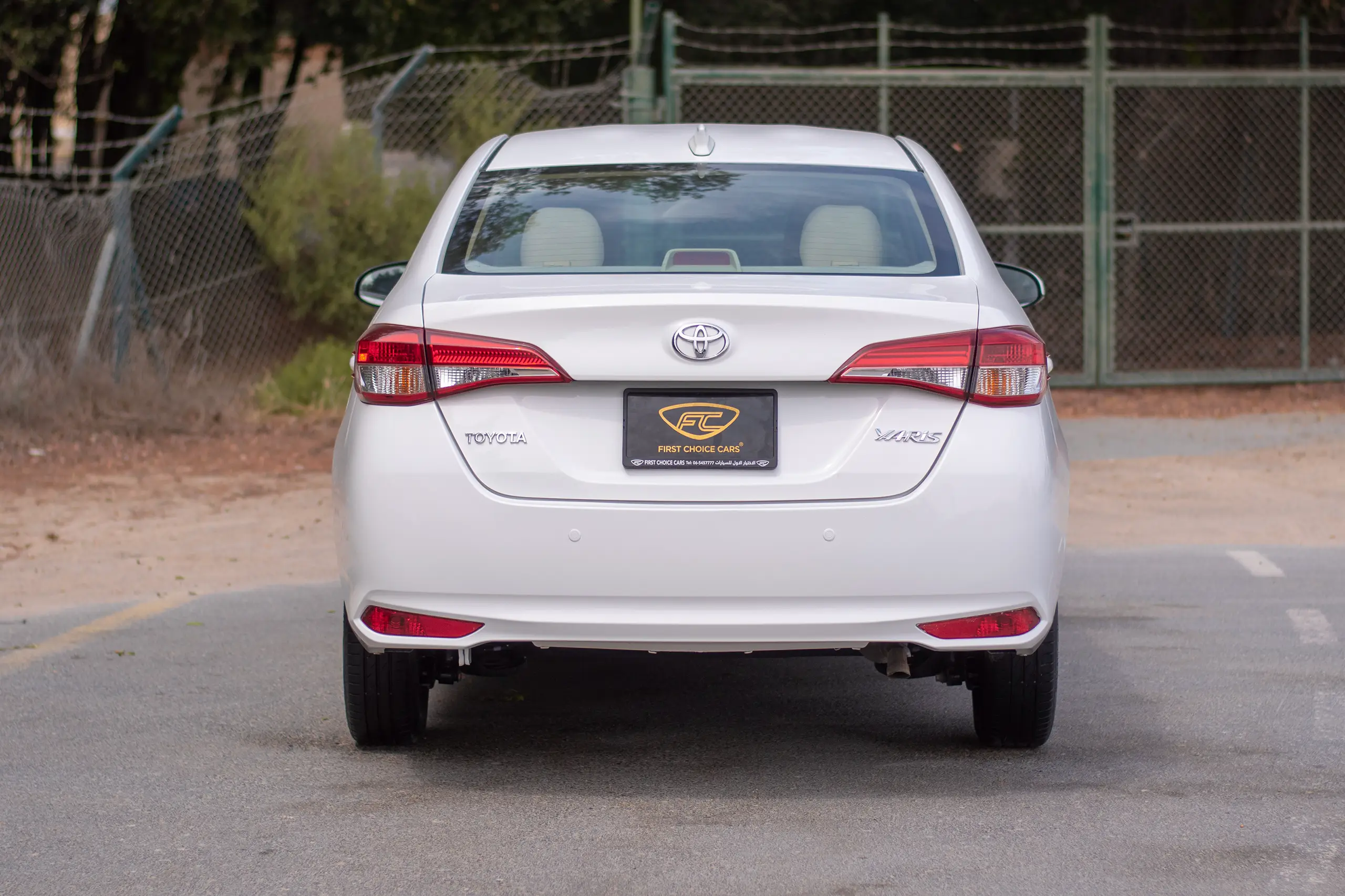Used 2022 Toyota Yaris E in White – Back/Rear View for Sale at First Choice Cars Dubai Sharjah