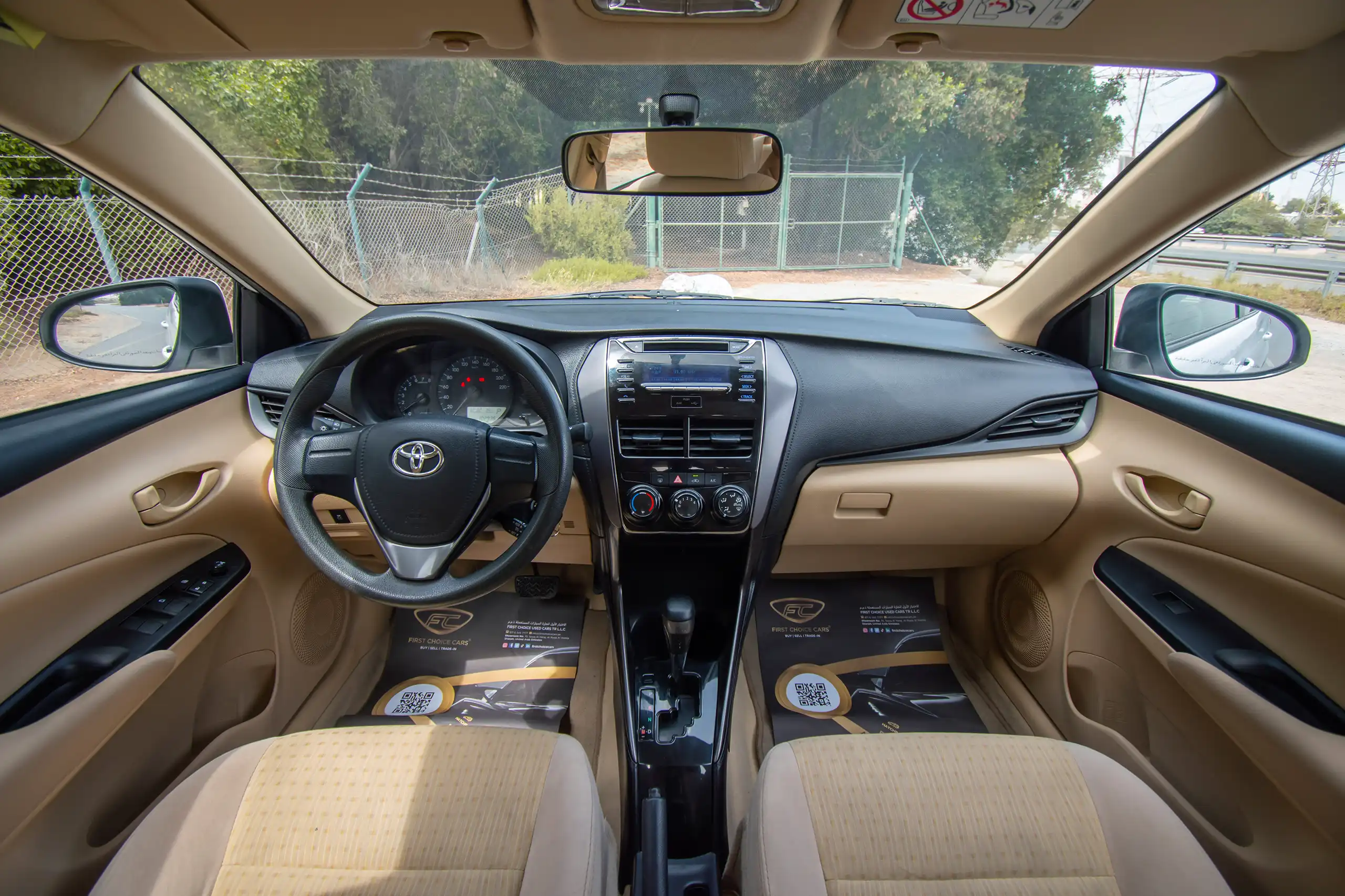 Used 2022 Toyota Yaris E in White – Front Cabin / Dashboard Full View for Sale at First Choice Cars Dubai Sharjah