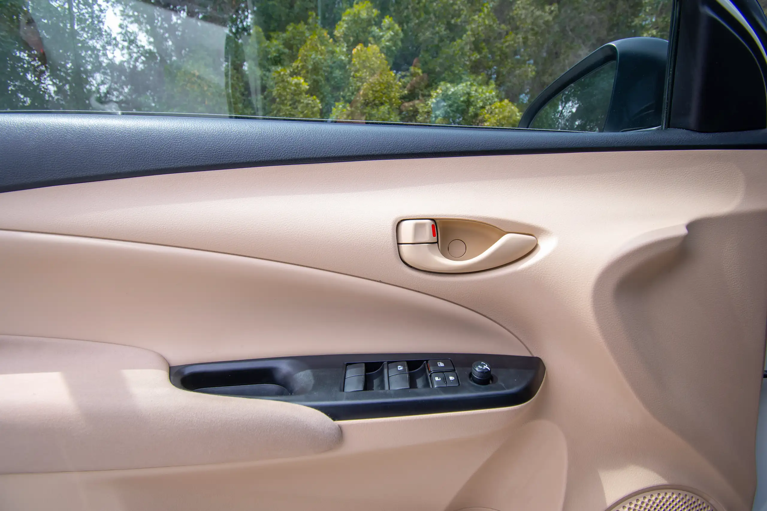 Used 2022 Toyota Yaris E in White – Driver Door Panel Full View for Sale at First Choice Cars Dubai Sharjah