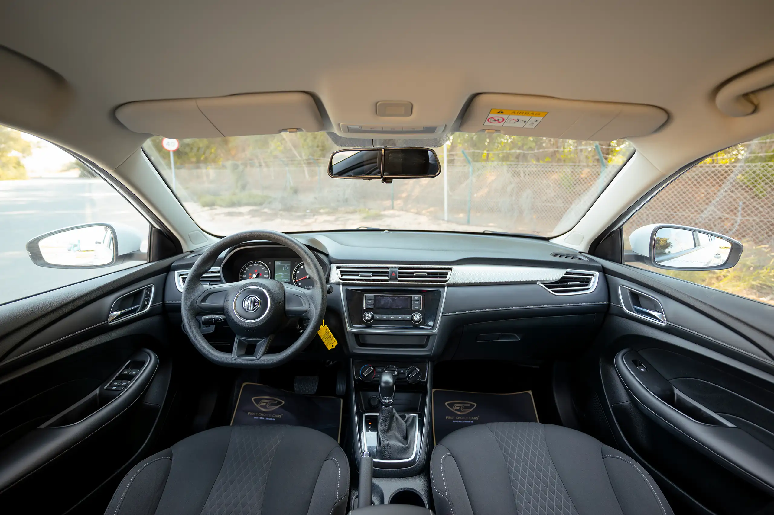 Used 2022 MG 5 Comfort White – Front Cabin / Dashboard Full View at First Choice Cars Sharjah