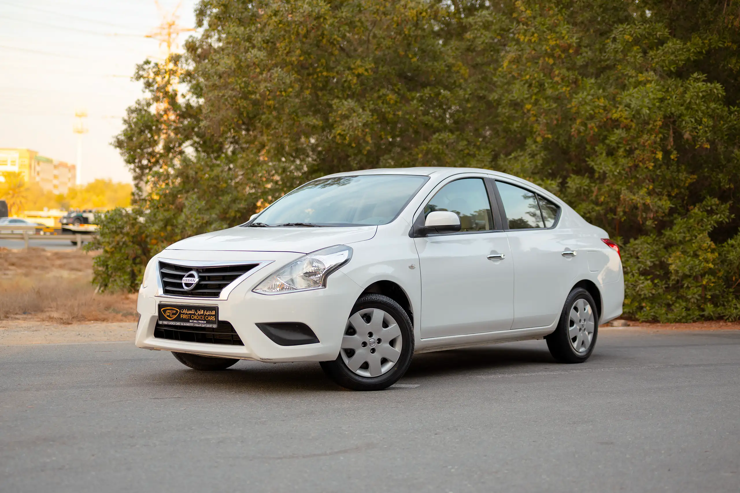 Used 2024 Nissan Sunny SV White – Left Front Diagonal (45°) View at First Choice Cars Sharjah