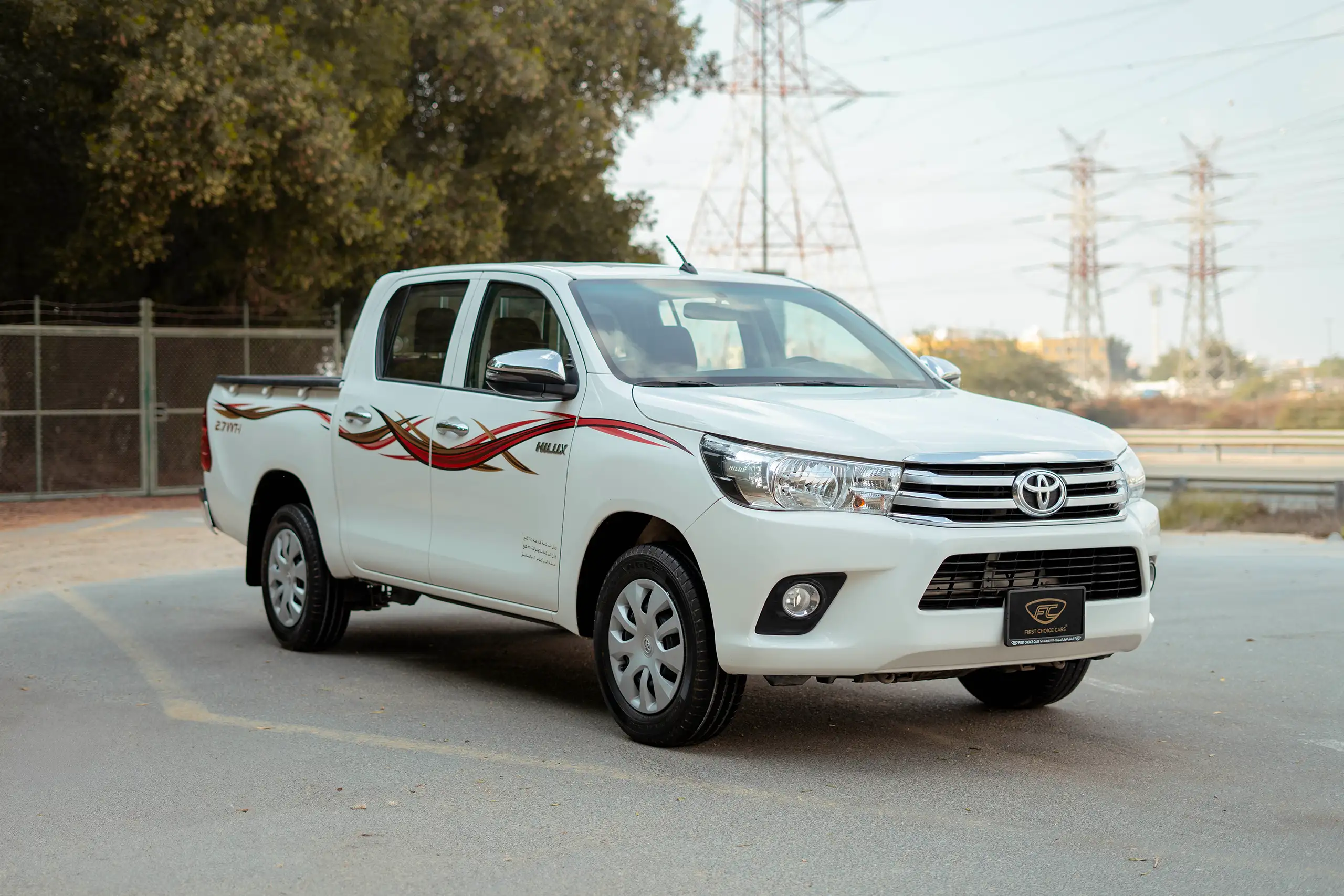 Used 2022 Toyota Hilux GLX Double Cabin White – Right Front Diagonal (45°) View at First Choice Cars Sharjah