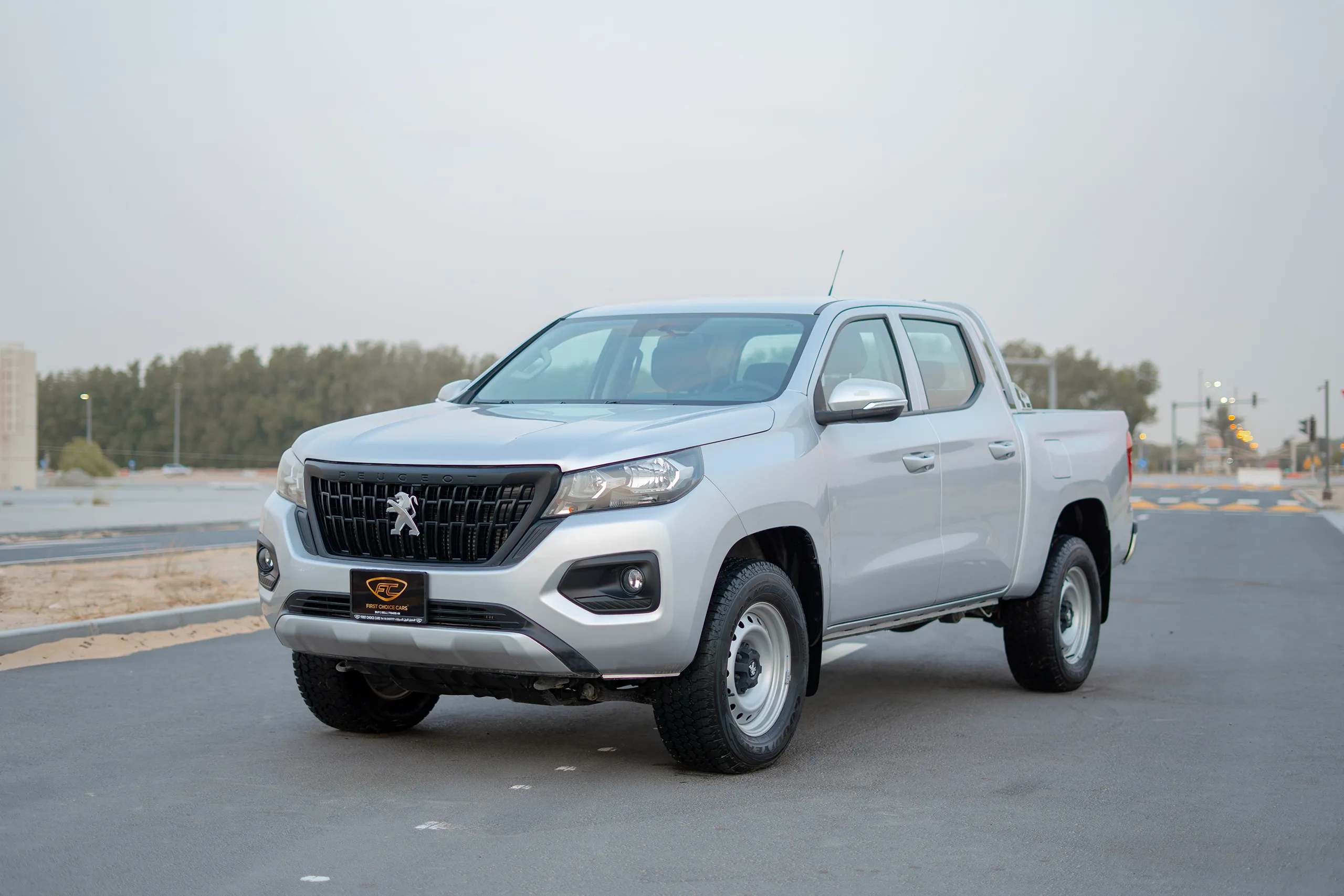 Used 2023 Peugeot Landtrek Double Cabin Silver – Left Front Diagonal (45°) View at First Choice Cars Sharjah