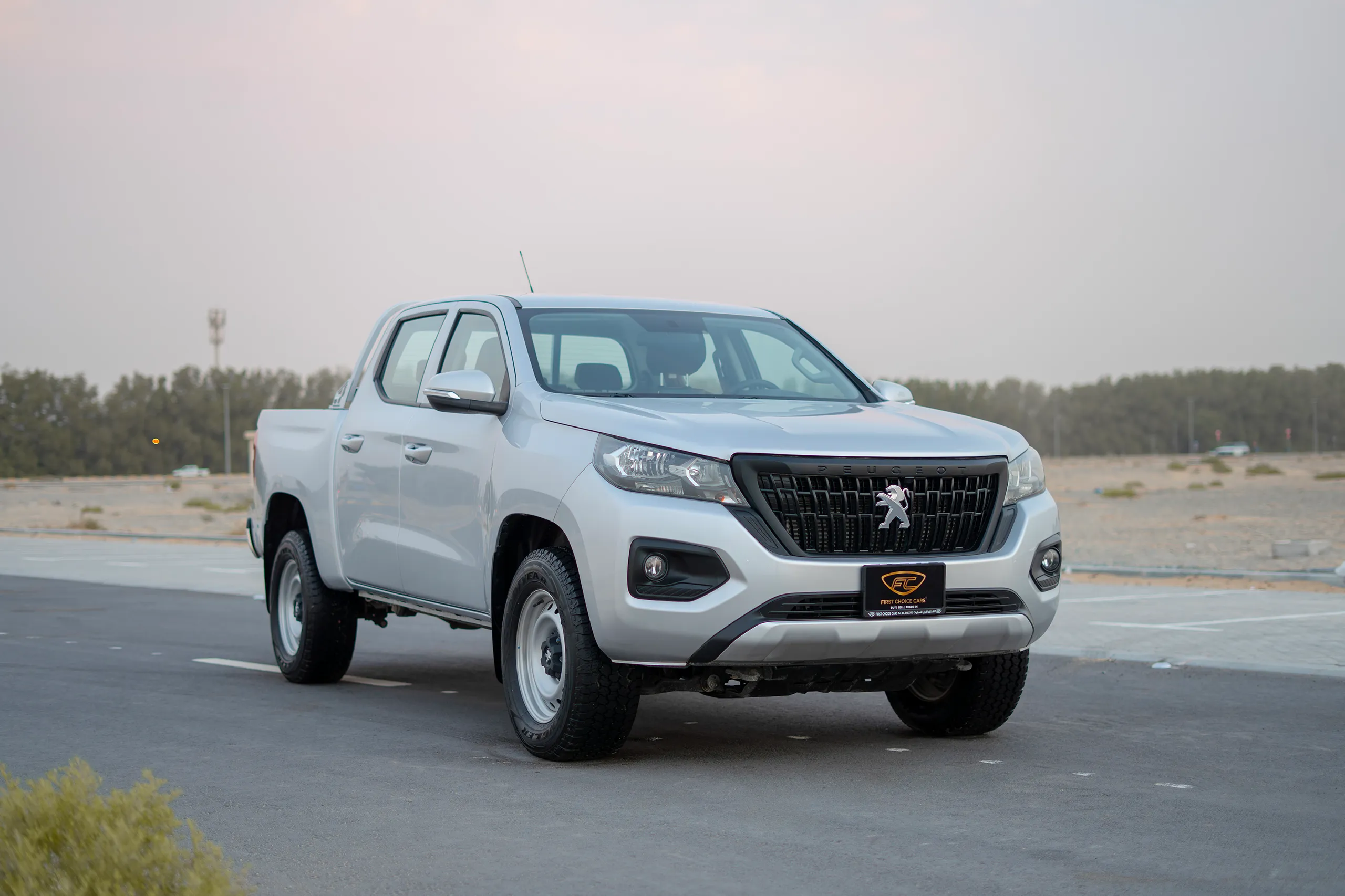 Used 2023 Peugeot Landtrek Double Cabin Silver – Right Front Diagonal (45°) View at First Choice Cars Sharjah