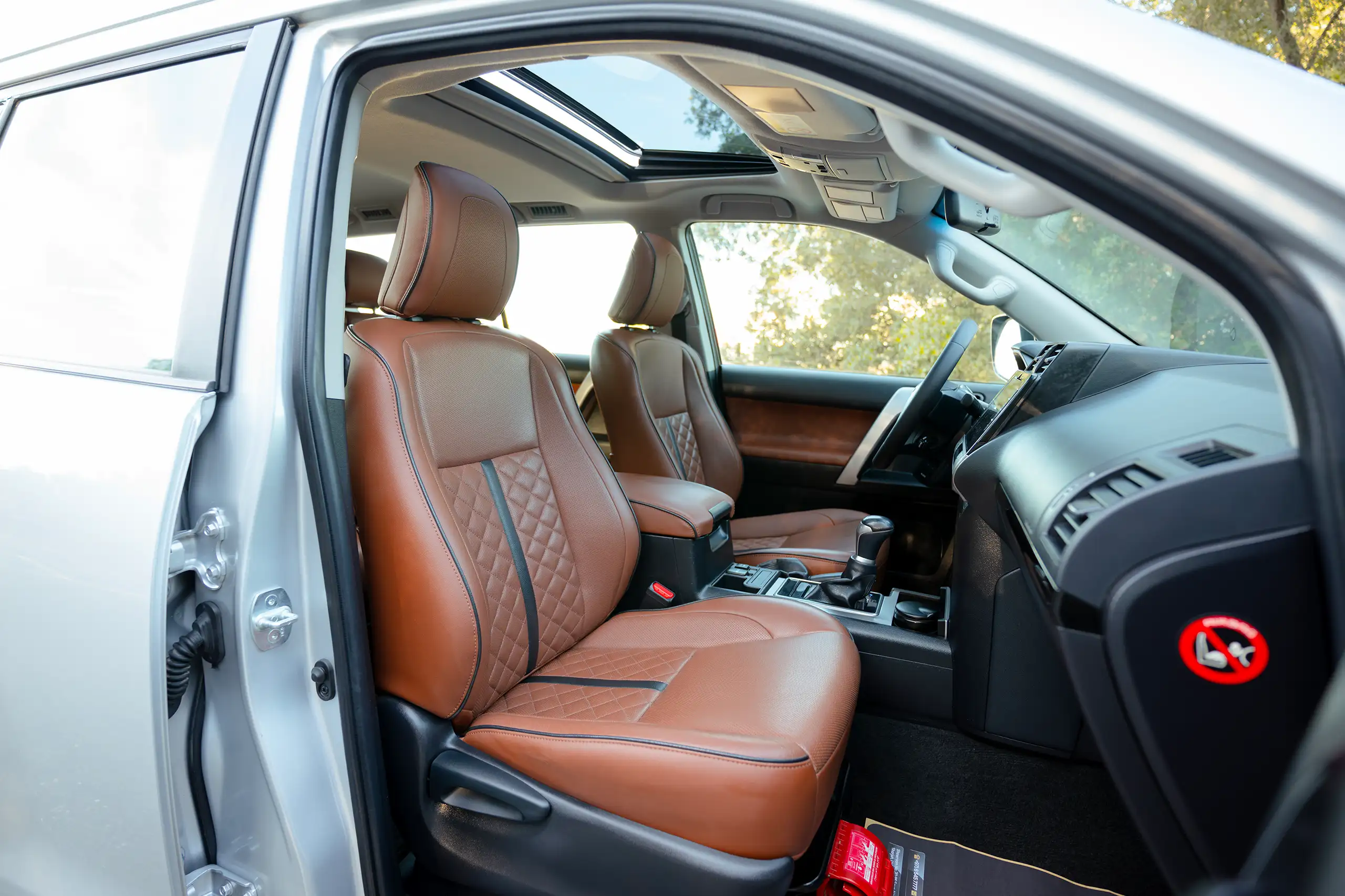 Used 2019 Toyota Prado VXR Silver – Front Passenger Side Cabin View at First Choice Cars Sharjah