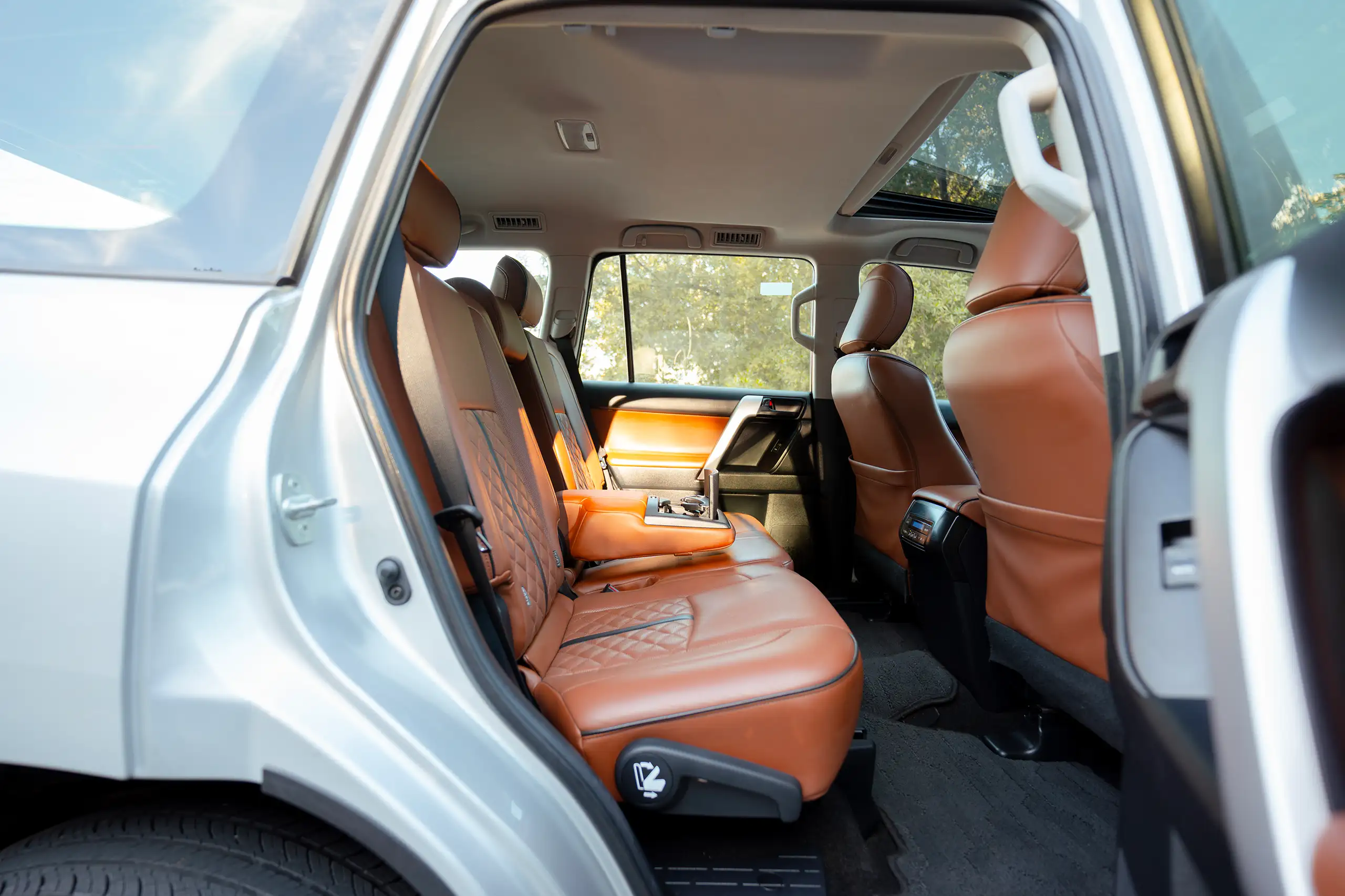 Used 2019 Toyota Prado VXR Silver – Rear Passenger Side Cabin View at First Choice Cars Sharjah