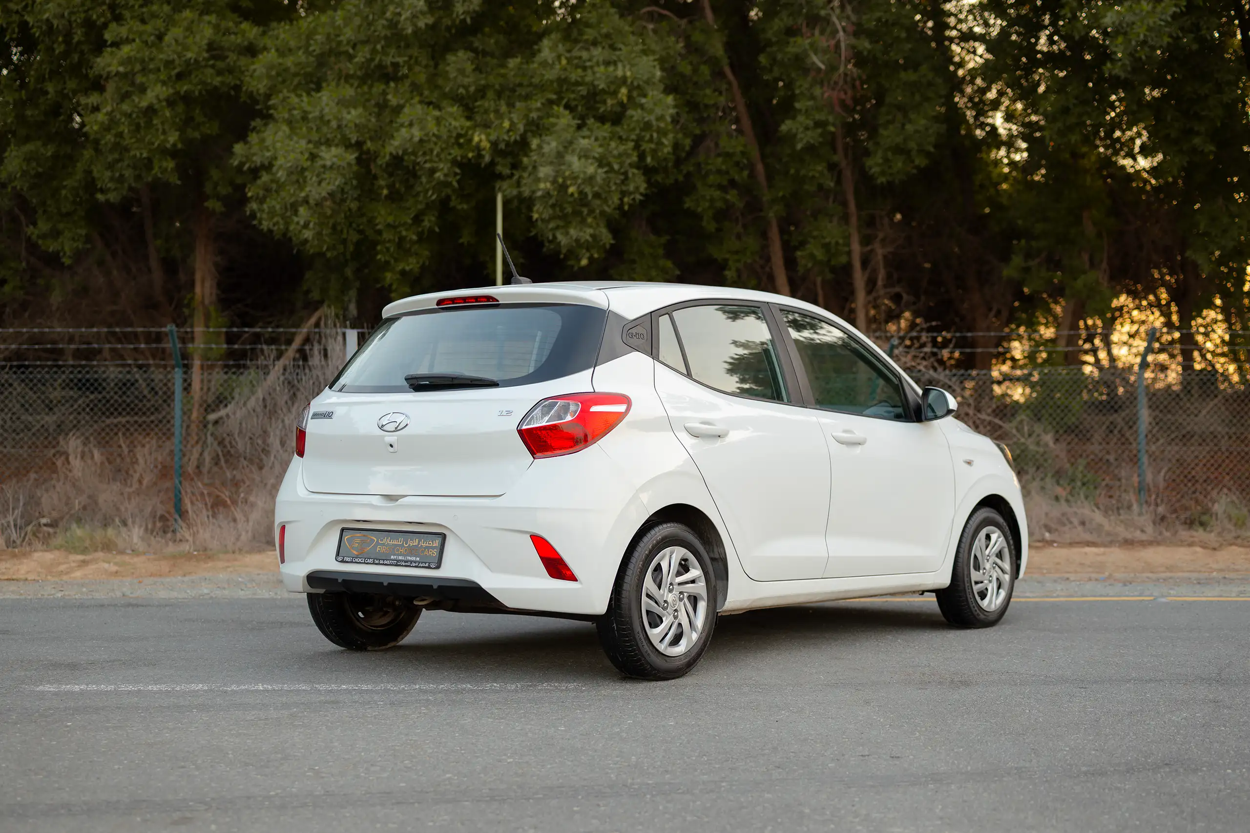 Used 2023 Hyundai Grand i10 Smart White – Right Back Diagonal (45°) View at First Choice Cars Sharjah