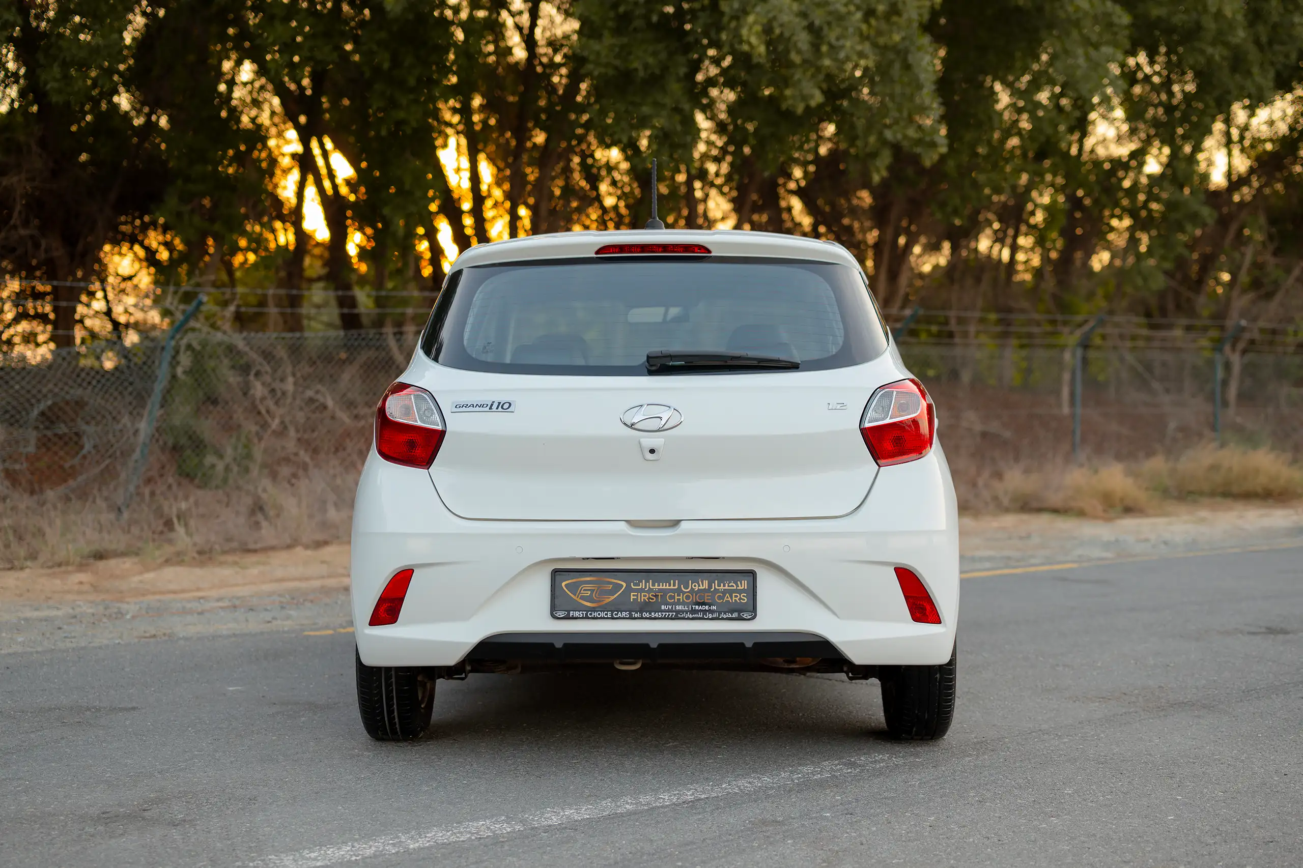 Used 2023 Hyundai Grand i10 Smart White – Back/Rear View at First Choice Cars Sharjah