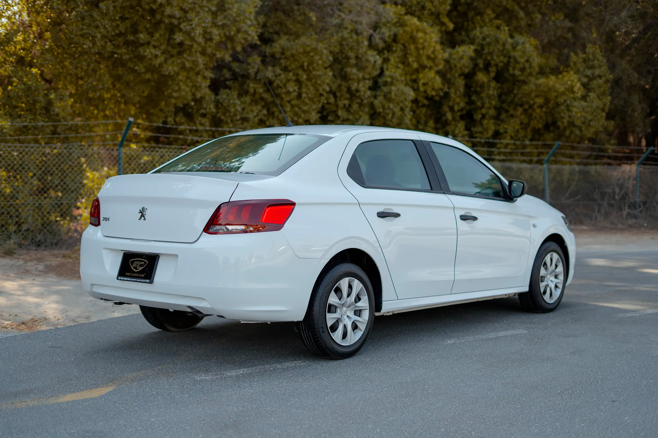 Used 2021 Peugeot 301 Allure White – Right Back Diagonal (45°) View at First Choice Cars Sharjah