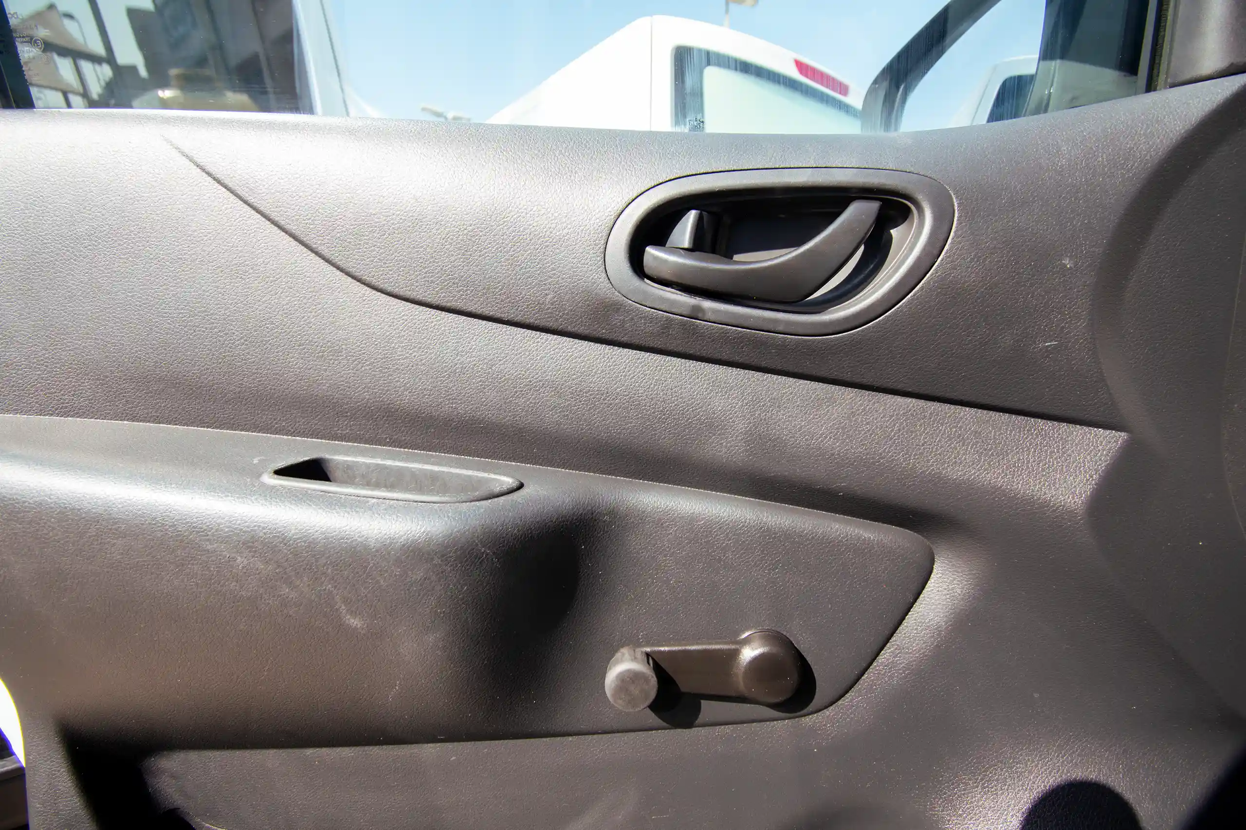 Used 2020 Nissan Navara SE White – Driver Door Panel Full View at First Choice Cars Sharjah