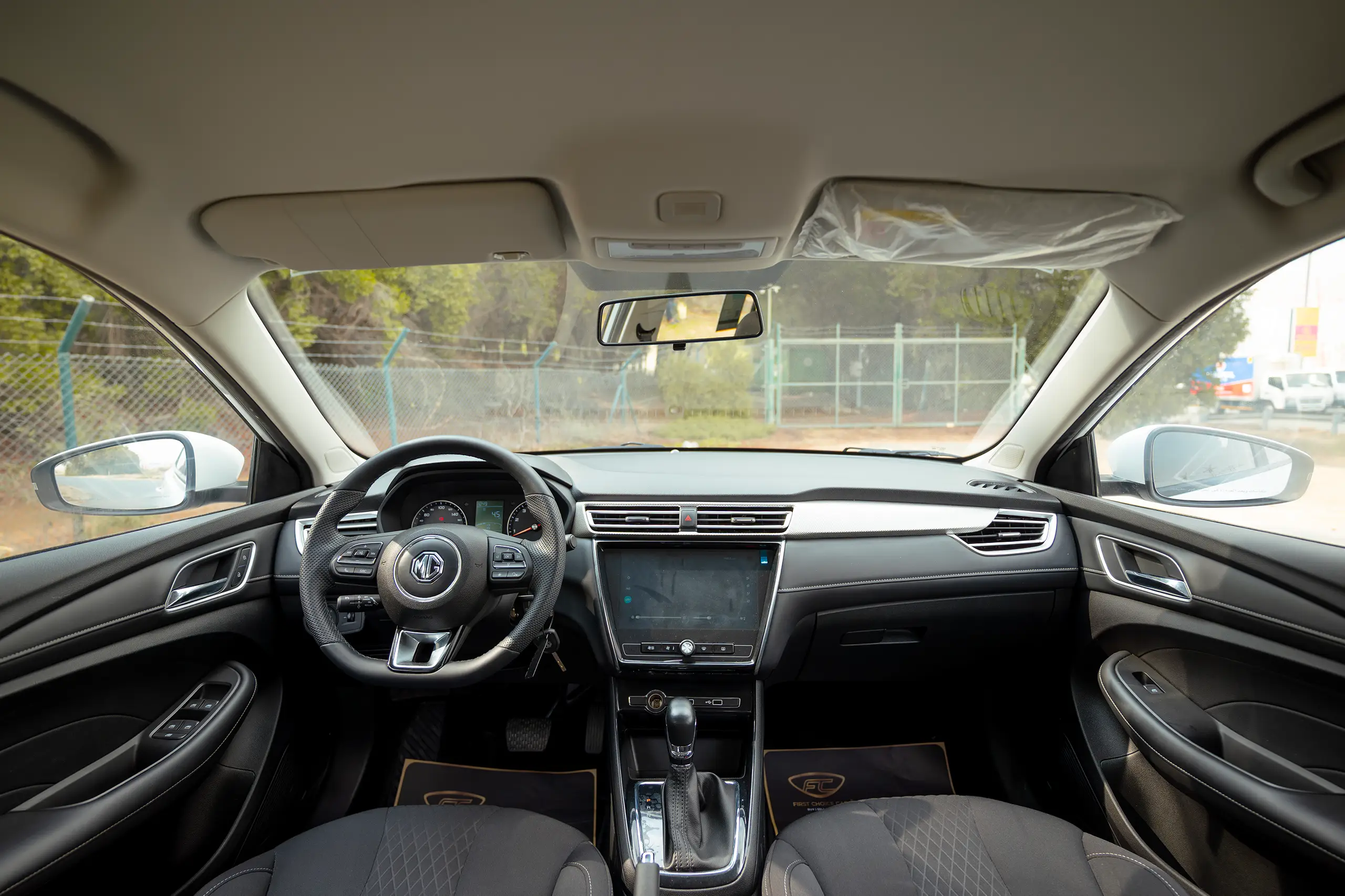 Used 2024 MG 5 Comfort White – Front Cabin / Dashboard Full View at First Choice Cars Sharjah