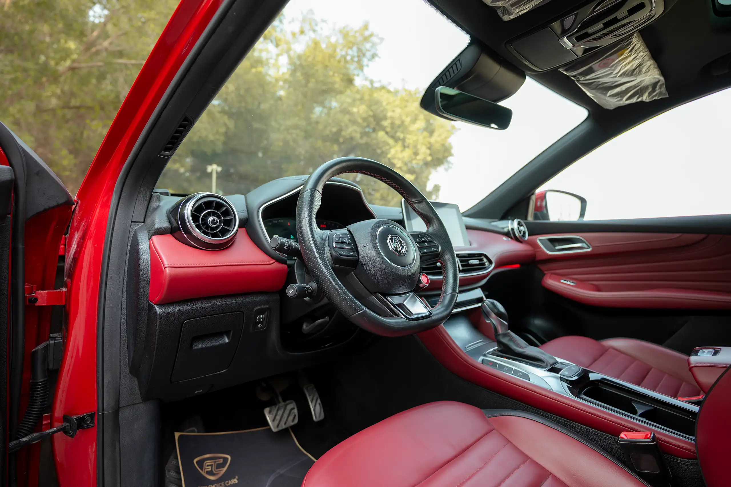 Used 2022 MG HS Luxury Red – Driver Side Dashboard & Steering View at First Choice Cars Sharjah