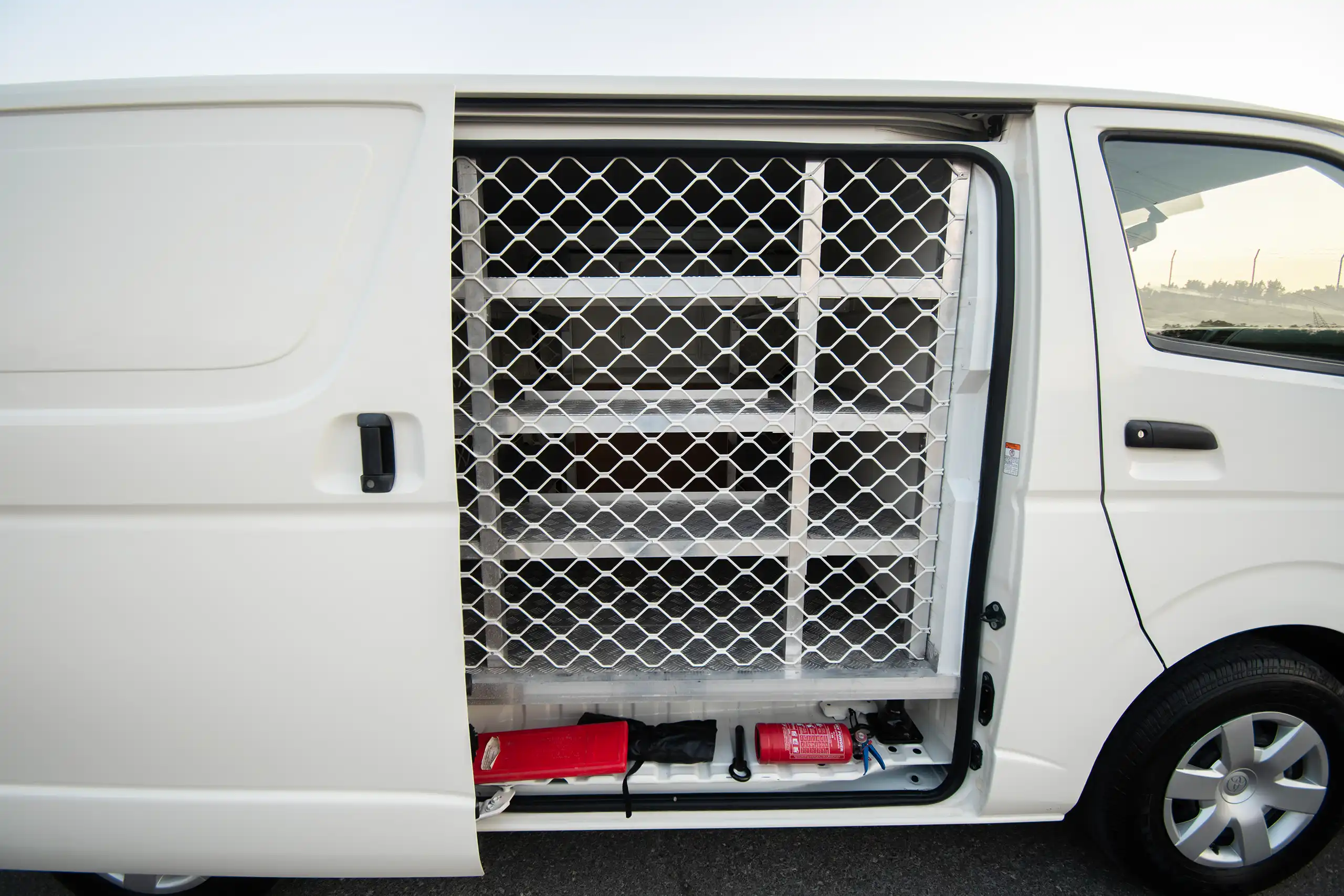 Used 2022 Toyota Hiace GL Standard Roof White – Delivery Box Right Side Interior View at First Choice Cars Sharjah