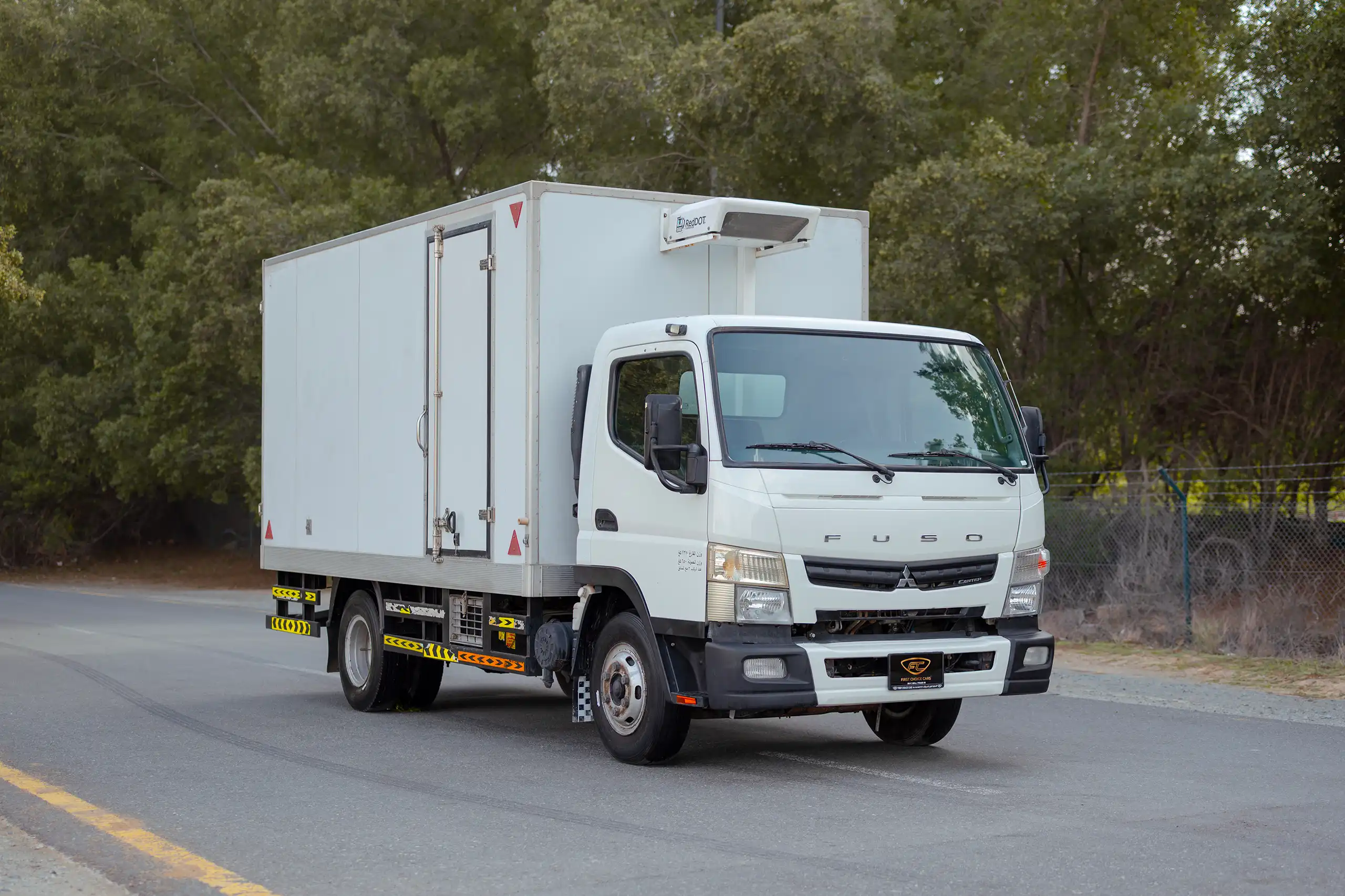Used 2020 Mitsubishi Canter Chiller Box White – Right Front Diagonal (45°) View at First Choice Cars Sharjah