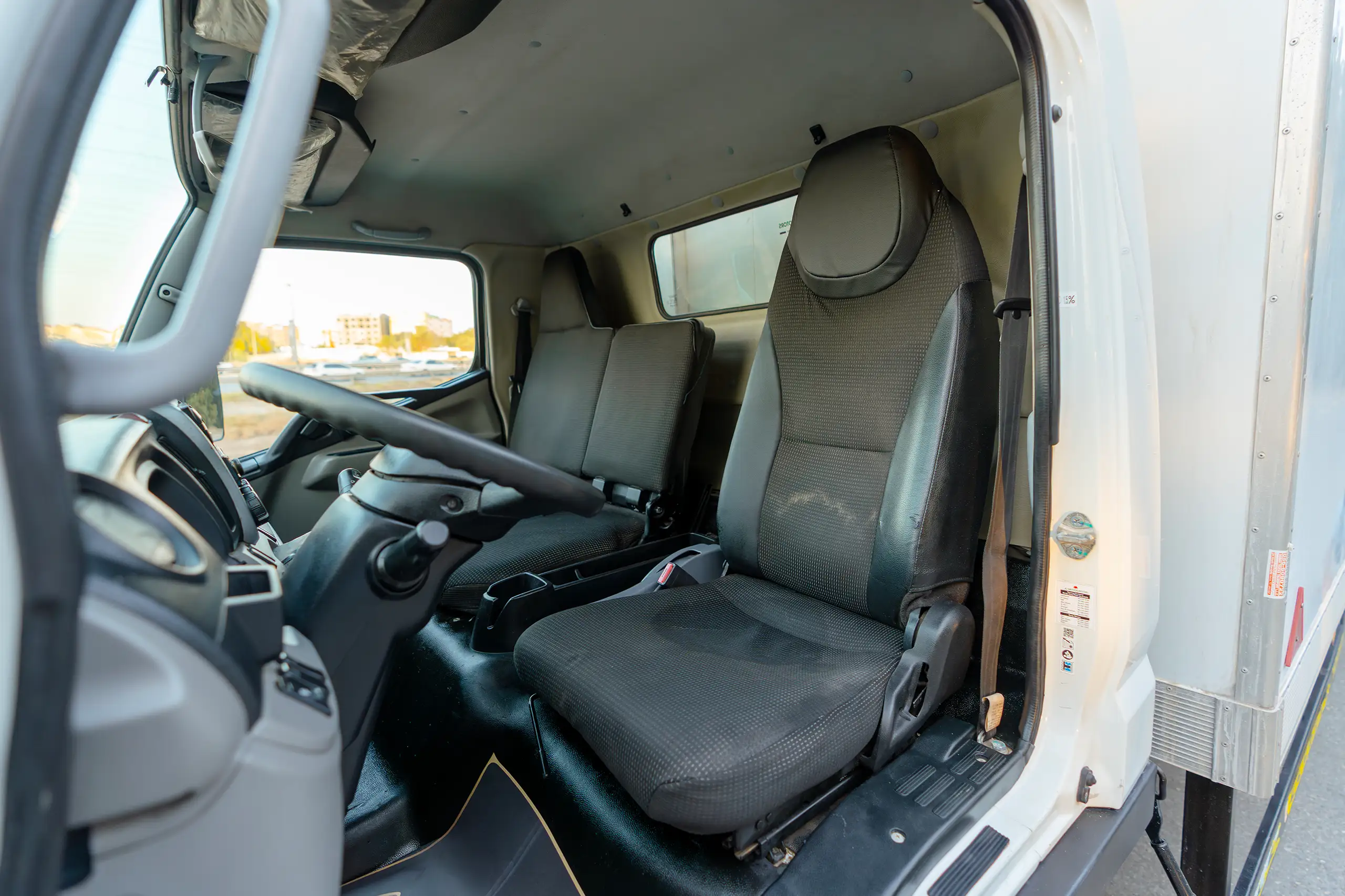 Used 2020 Mitsubishi Canter Chiller Box White – Front Driver Side Cabin View at First Choice Cars Sharjah