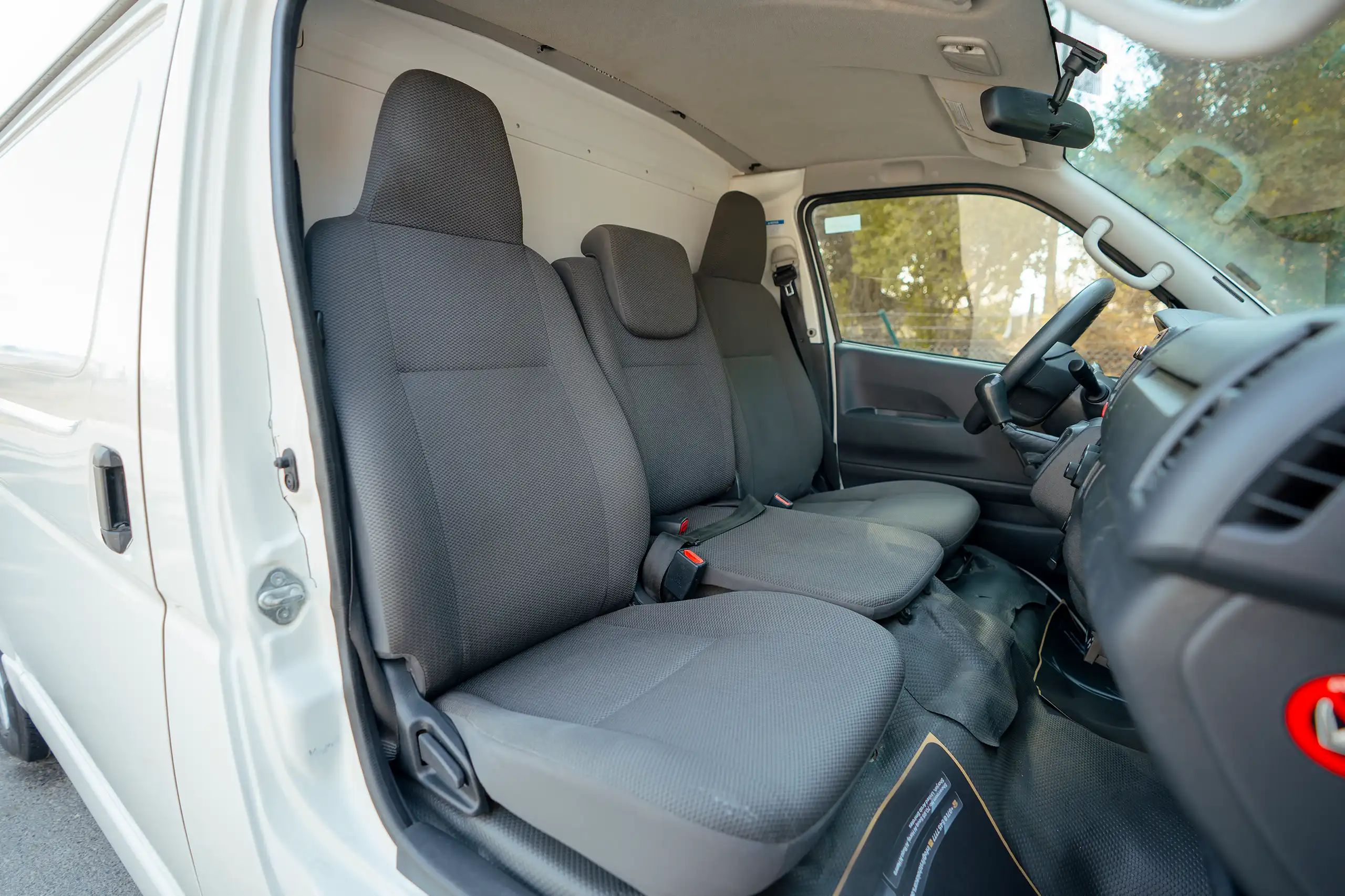 Used 2023 Toyota Hiace GL Standard Roof White – Front Passenger Side Cabin View at First Choice Cars Sharjah