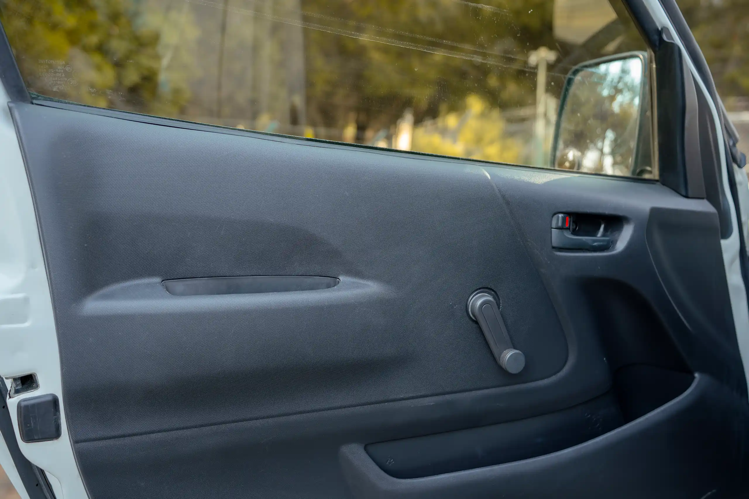 Used 2023 Toyota Hiace GL Standard Roof White – Driver Door Panel Full View at First Choice Cars Sharjah