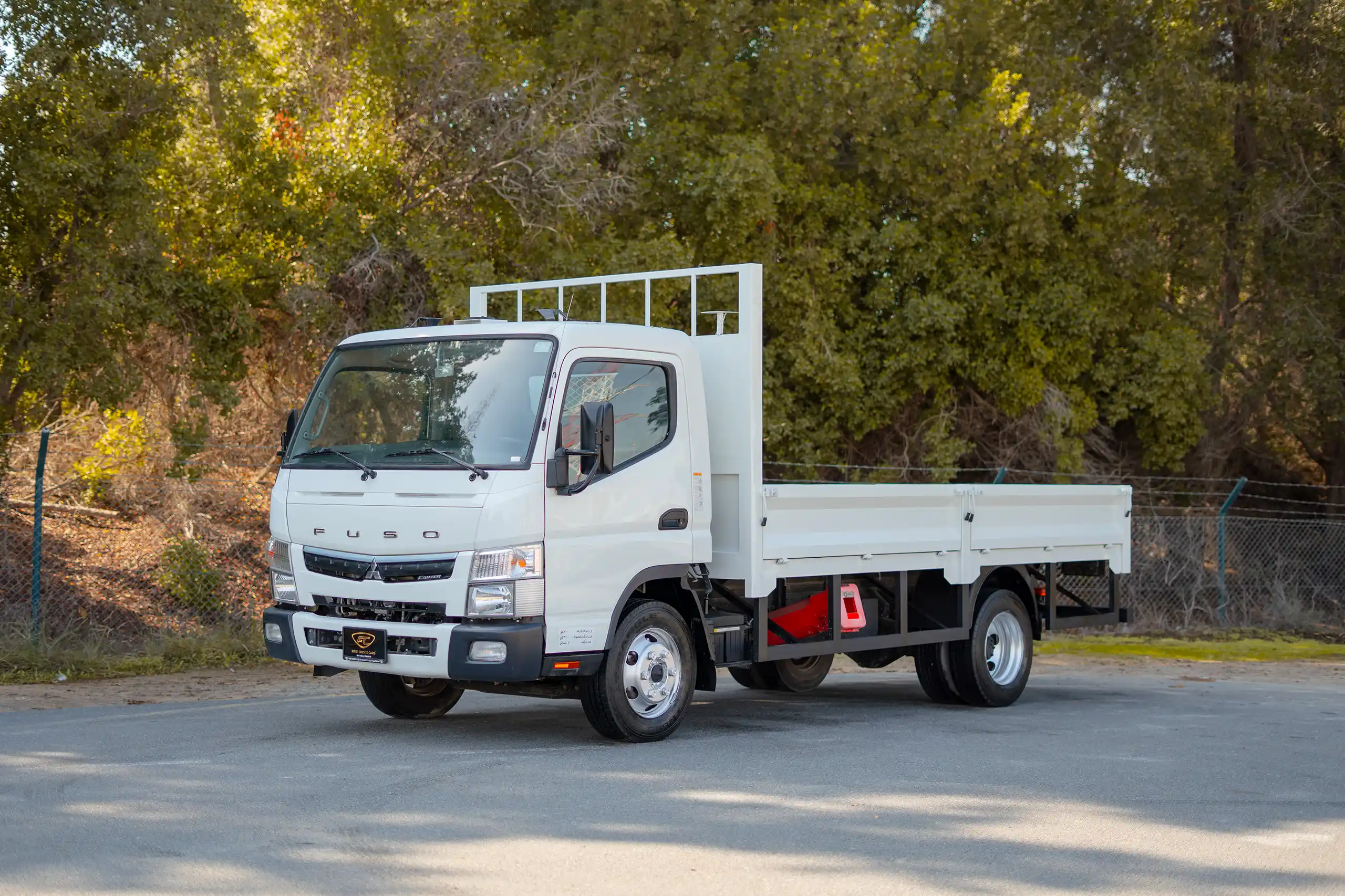 Used 2022 Mitsubishi Canter Cargo Body in White – Left Front Diagonal (45°) View for Sale at First Choice Cars Dubai Sharjah