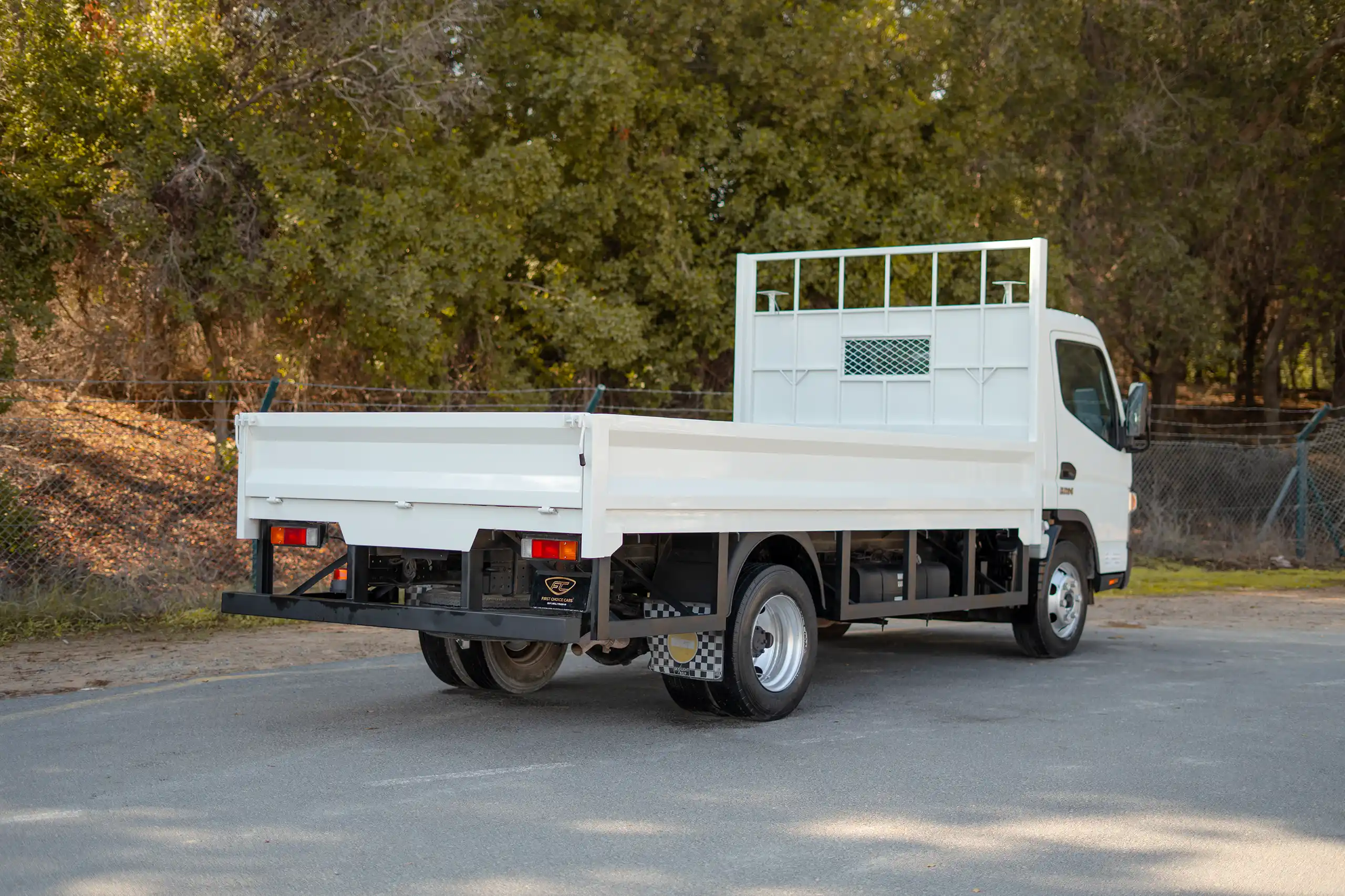 Used 2022 Mitsubishi Canter Cargo Body in White – Right Back Diagonal (45°) View for Sale at First Choice Cars Dubai Sharjah