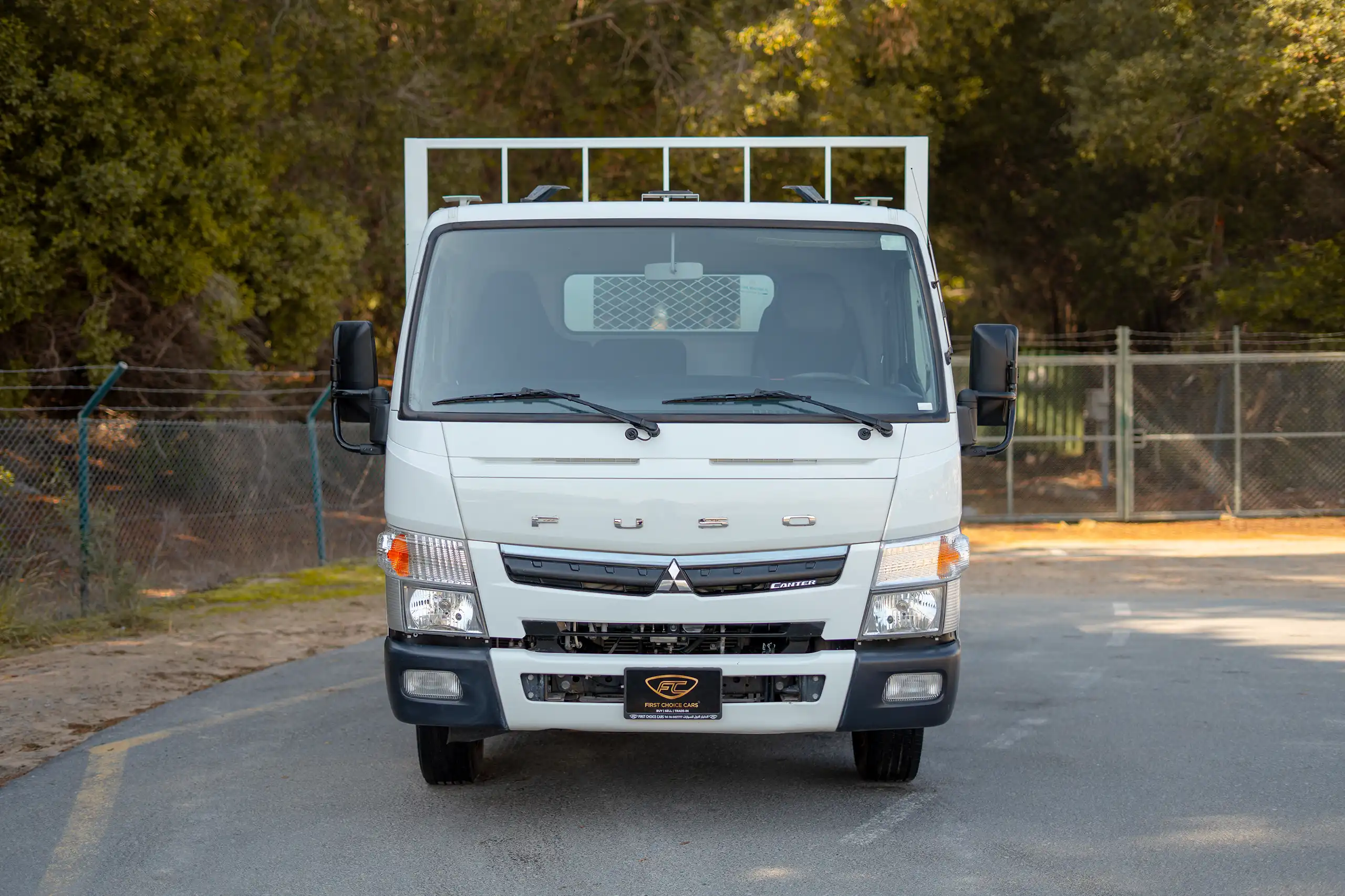 Used 2022 Mitsubishi Canter Cargo Body in White – Front View for Sale at First Choice Cars Dubai Sharjah