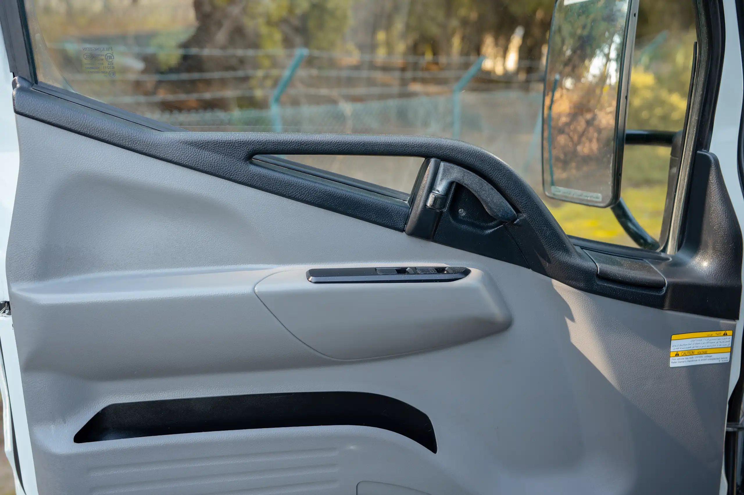 Used 2022 Mitsubishi Canter Cargo Body in White – Driver Door Panel Full View for Sale at First Choice Cars Dubai Sharjah