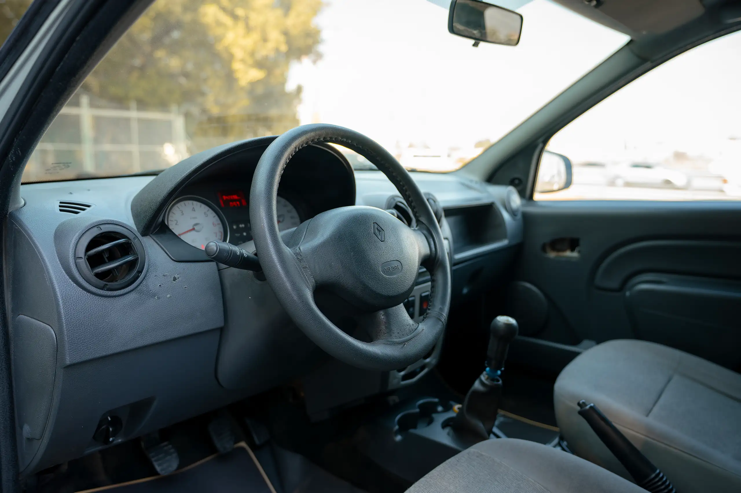 Used 2011 Renault Logan Delivery Van White – Driver Side Dashboard & Steering View at First Choice Cars Sharjah