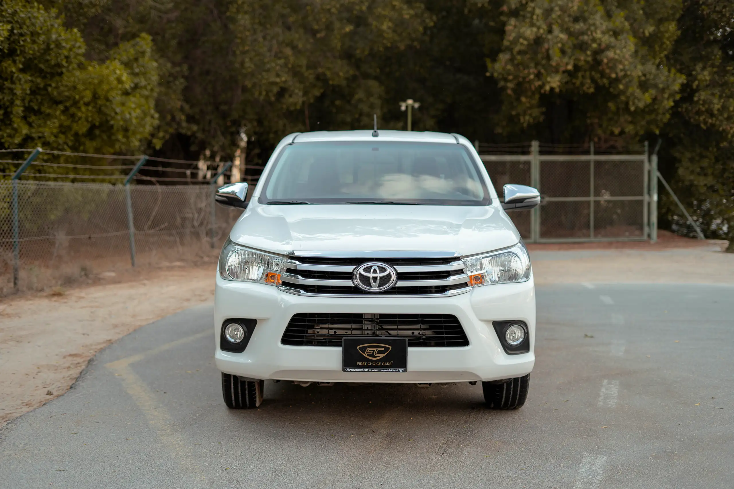Used 2022 Toyota Hilux GLX Double Cabin White – Front View at First Choice Cars Sharjah