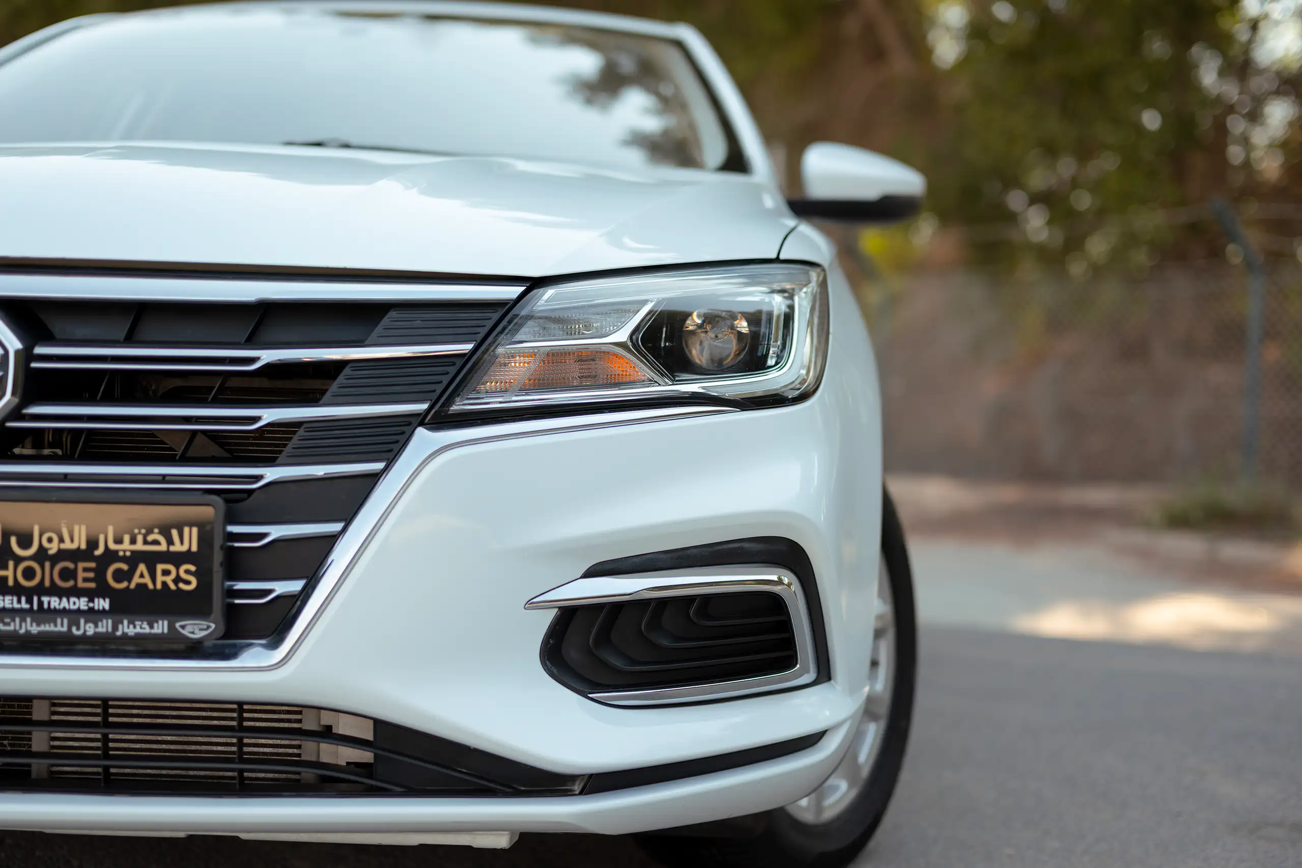 Used 2023 MG 5 Comfort White – Headlight Close-up at First Choice Cars Sharjah