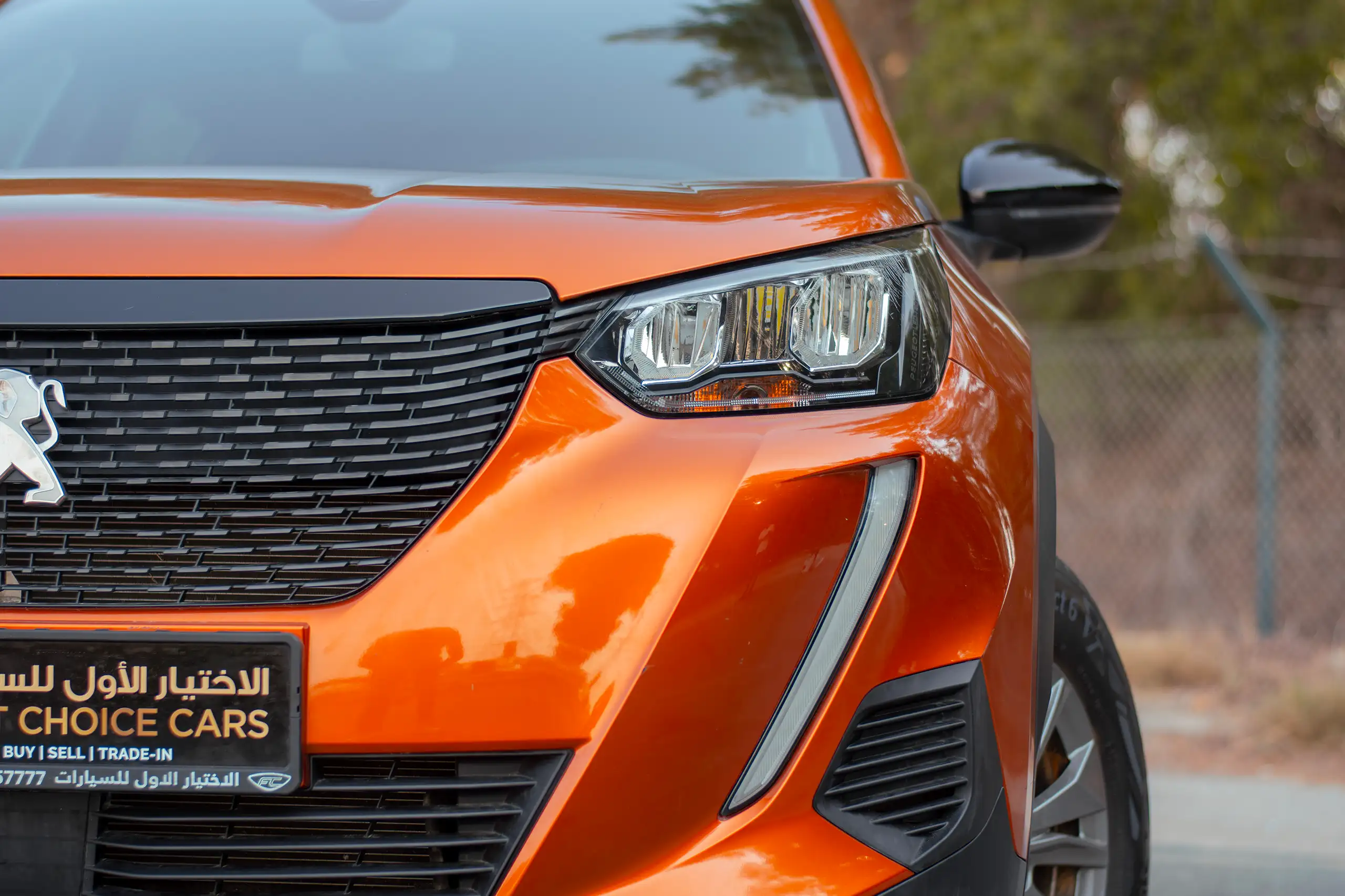 Used 2023 Peugeot 2008 Active Orange – Headlight Close-up at First Choice Cars Sharjah