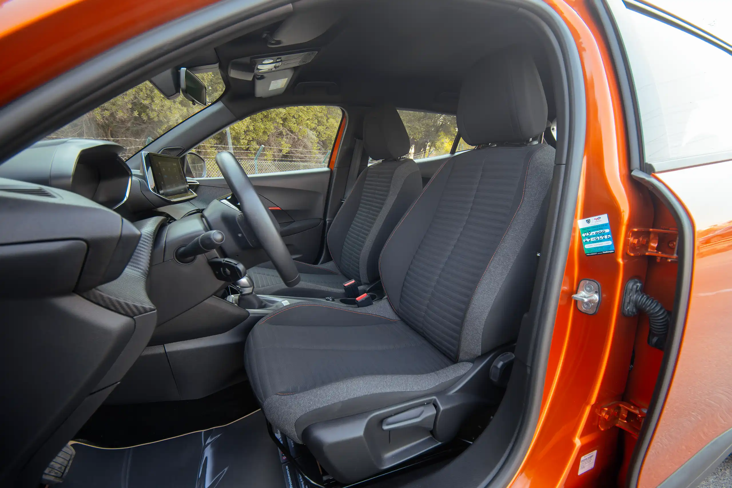 Used 2023 Peugeot 2008 Active Orange – Front Driver Side Cabin View at First Choice Cars Sharjah