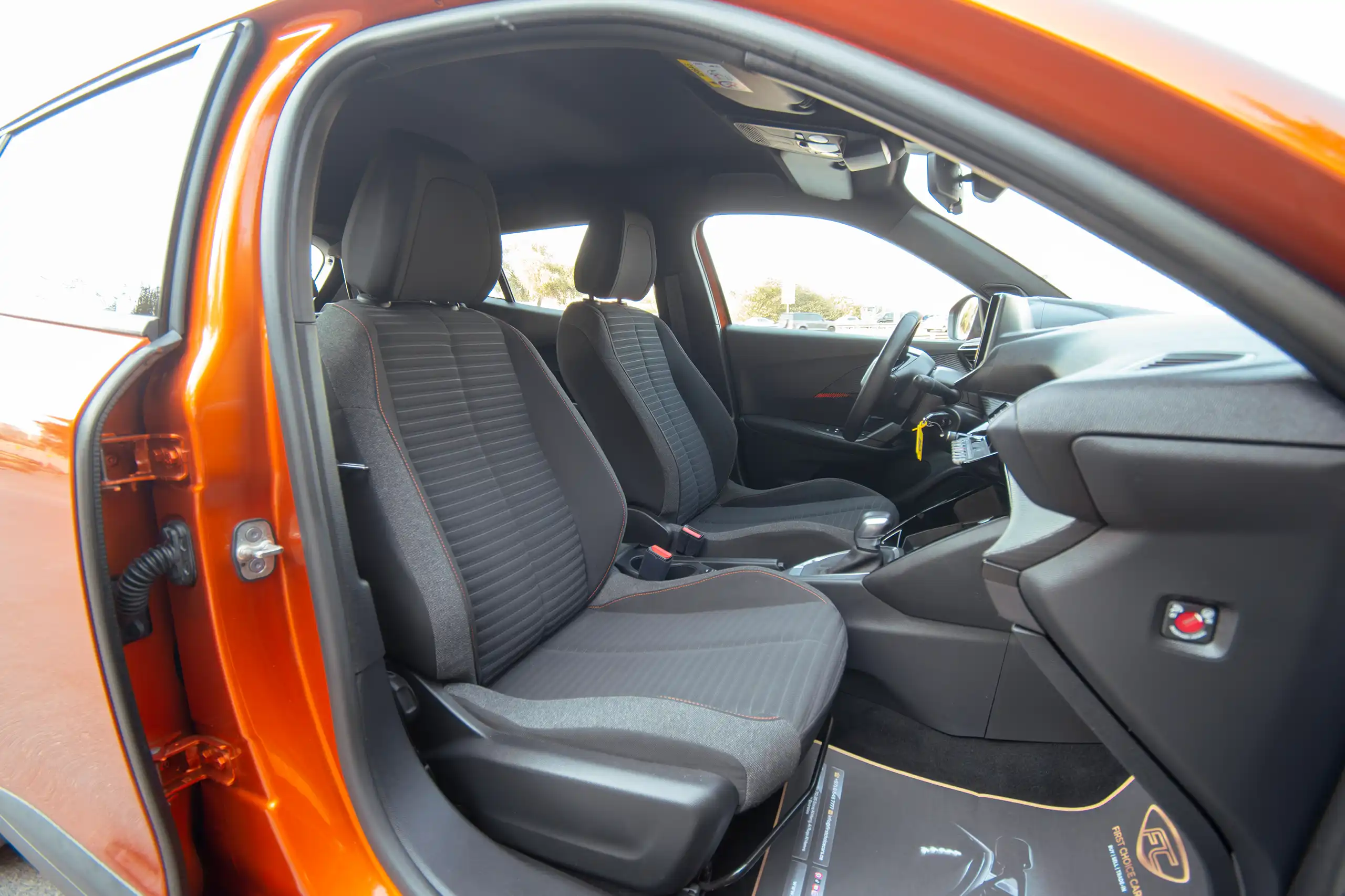 Used 2023 Peugeot 2008 Active Orange – Front Passenger Side Cabin View at First Choice Cars Sharjah
