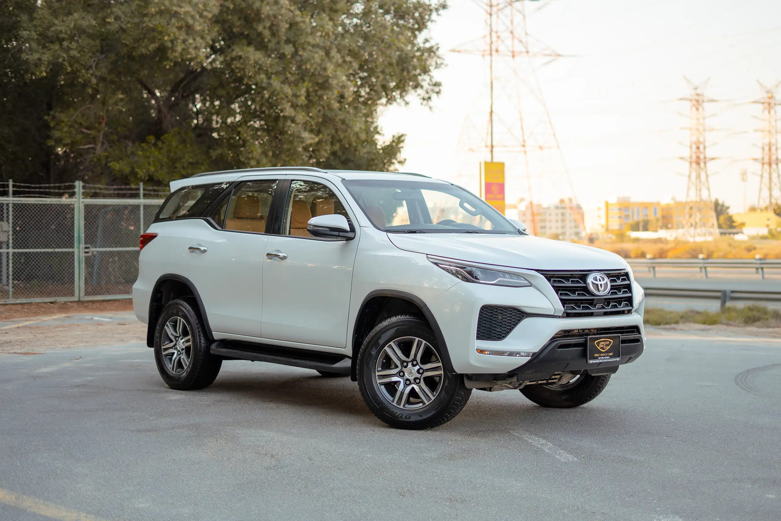 Used 2024 Toyota Fortuner EXR White – Right Front Diagonal (45°) View at First Choice Cars Sharjah