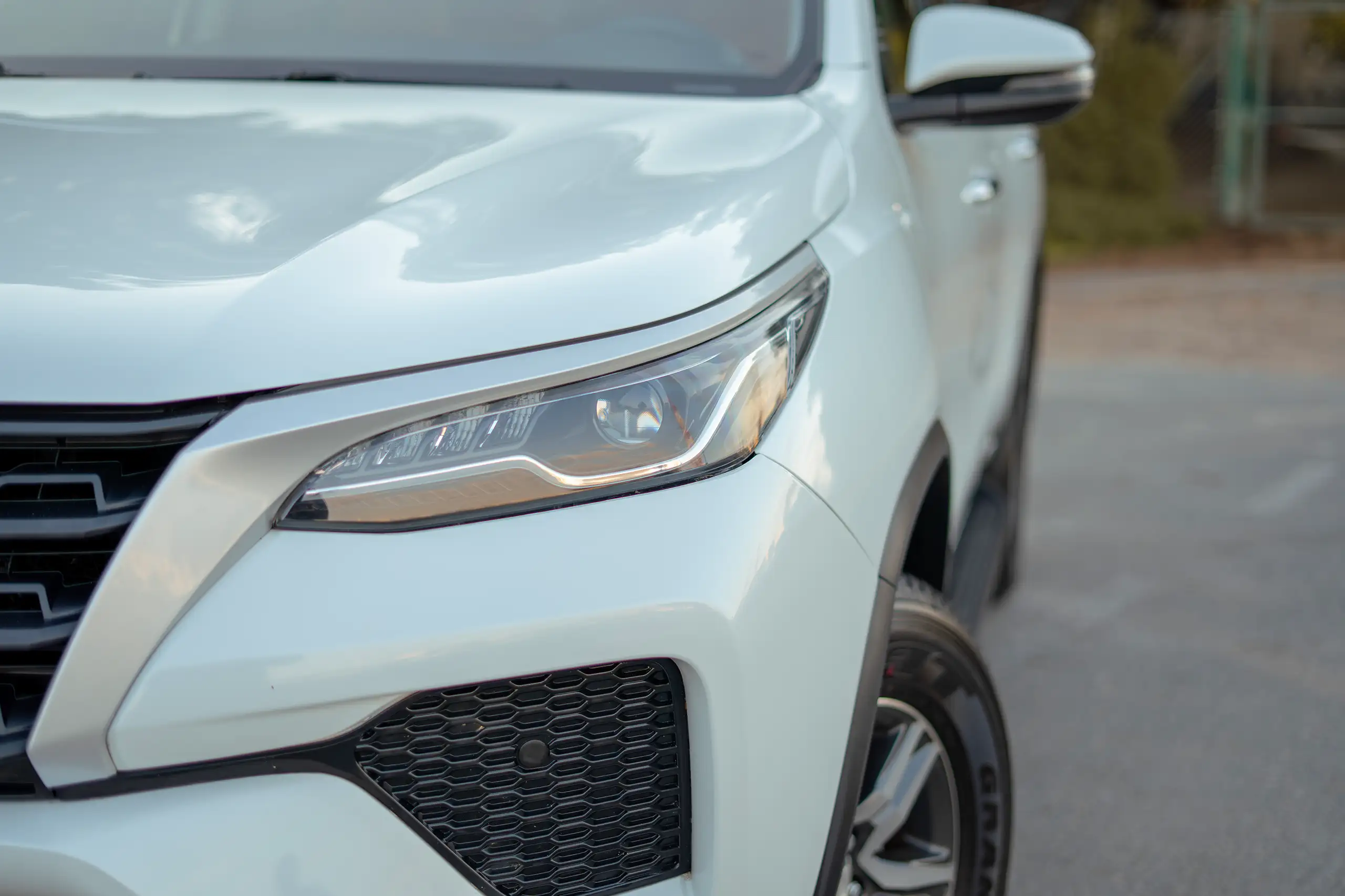 Used 2024 Toyota Fortuner EXR White – Headlight Close-up at First Choice Cars Sharjah