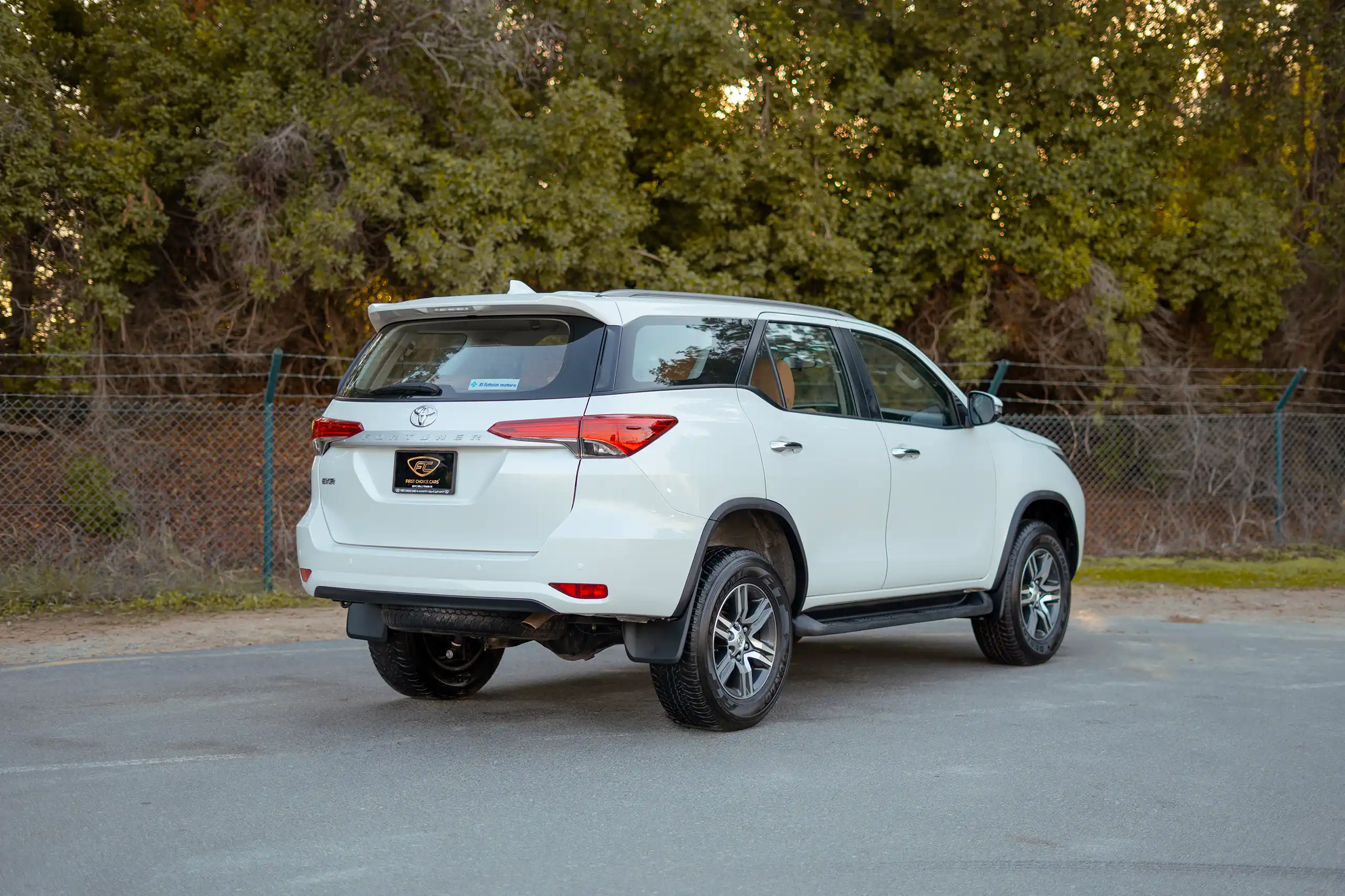 Used 2024 Toyota Fortuner EXR White – Right Back Diagonal (45°) View at First Choice Cars Sharjah