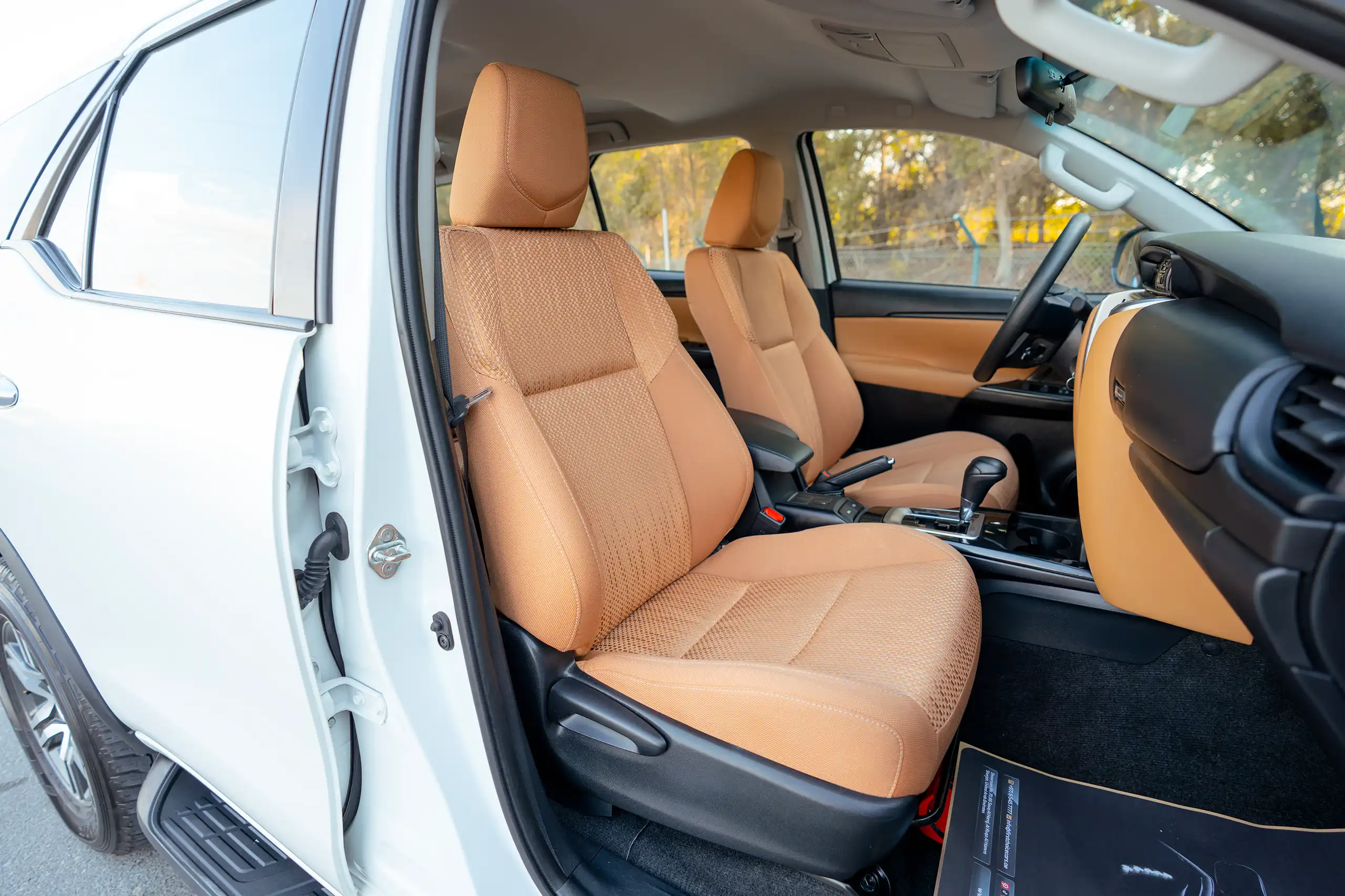 Used 2024 Toyota Fortuner EXR White – Front Passenger Side Cabin View at First Choice Cars Sharjah