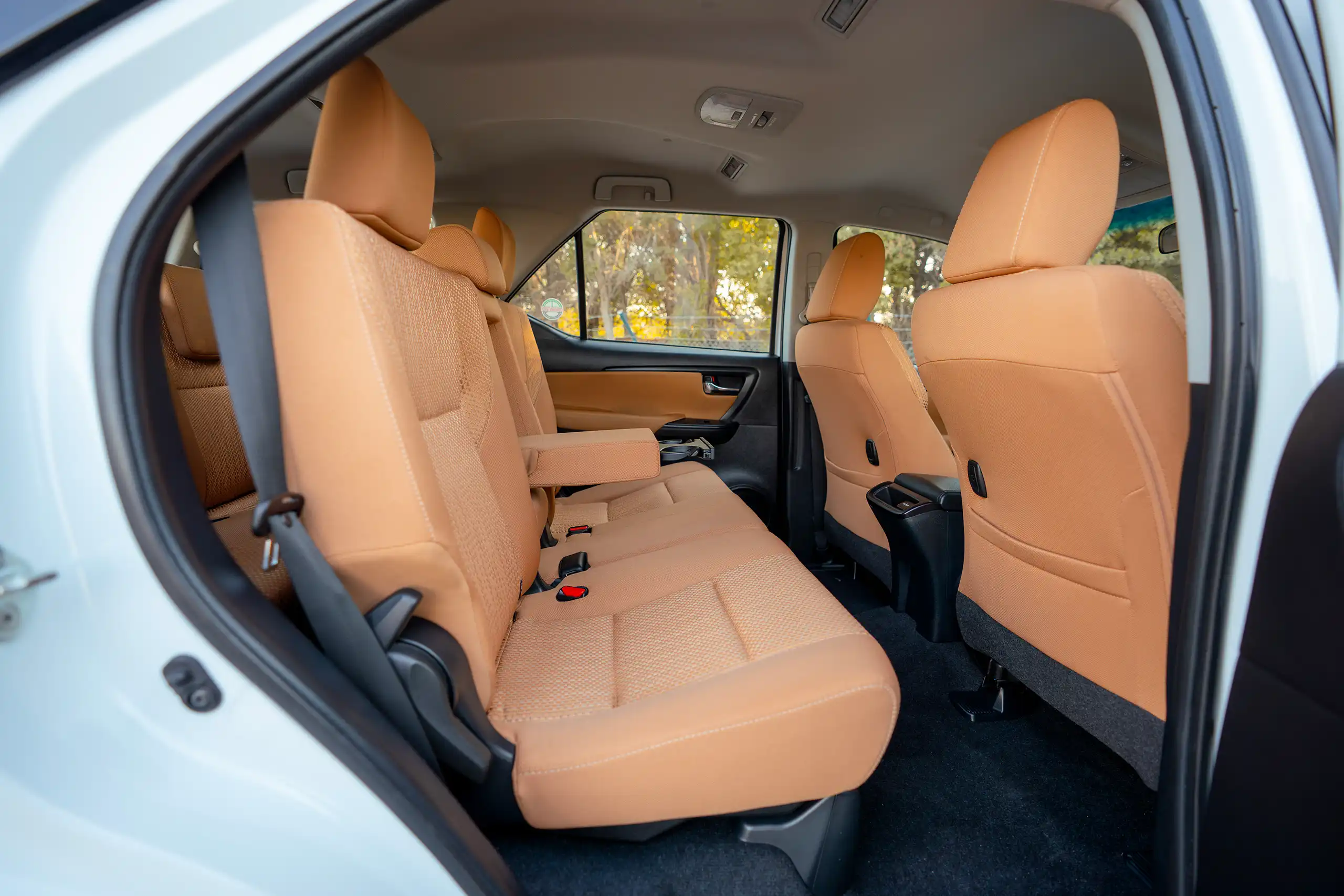 Used 2024 Toyota Fortuner EXR White – Rear Passenger Side Cabin View at First Choice Cars Sharjah