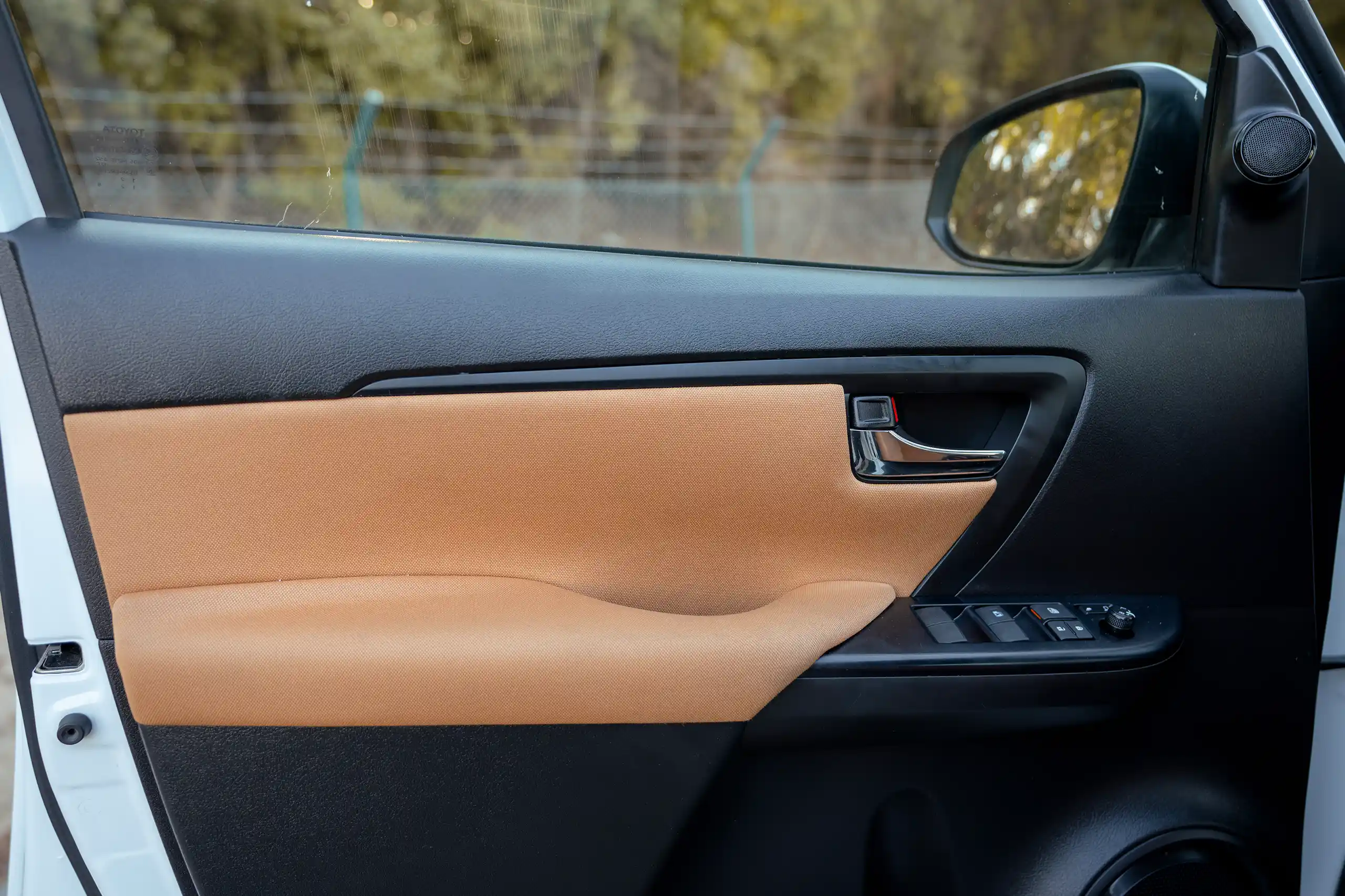 Used 2024 Toyota Fortuner EXR White – Driver Door Panel Full View at First Choice Cars Sharjah