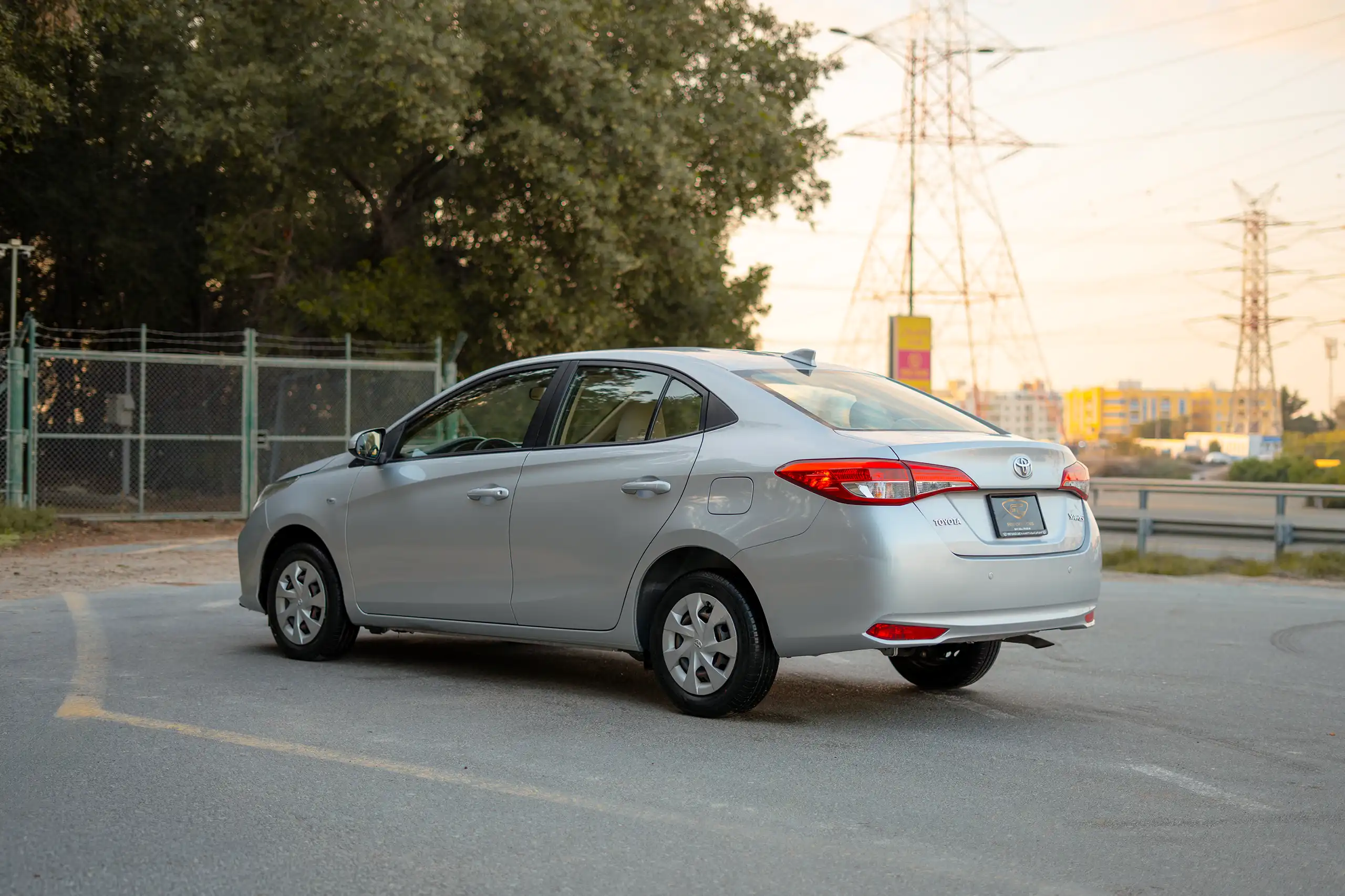 Used 2022 Toyota Yaris E Silver – Left Back Diagonal (45°) View at First Choice Cars Sharjah