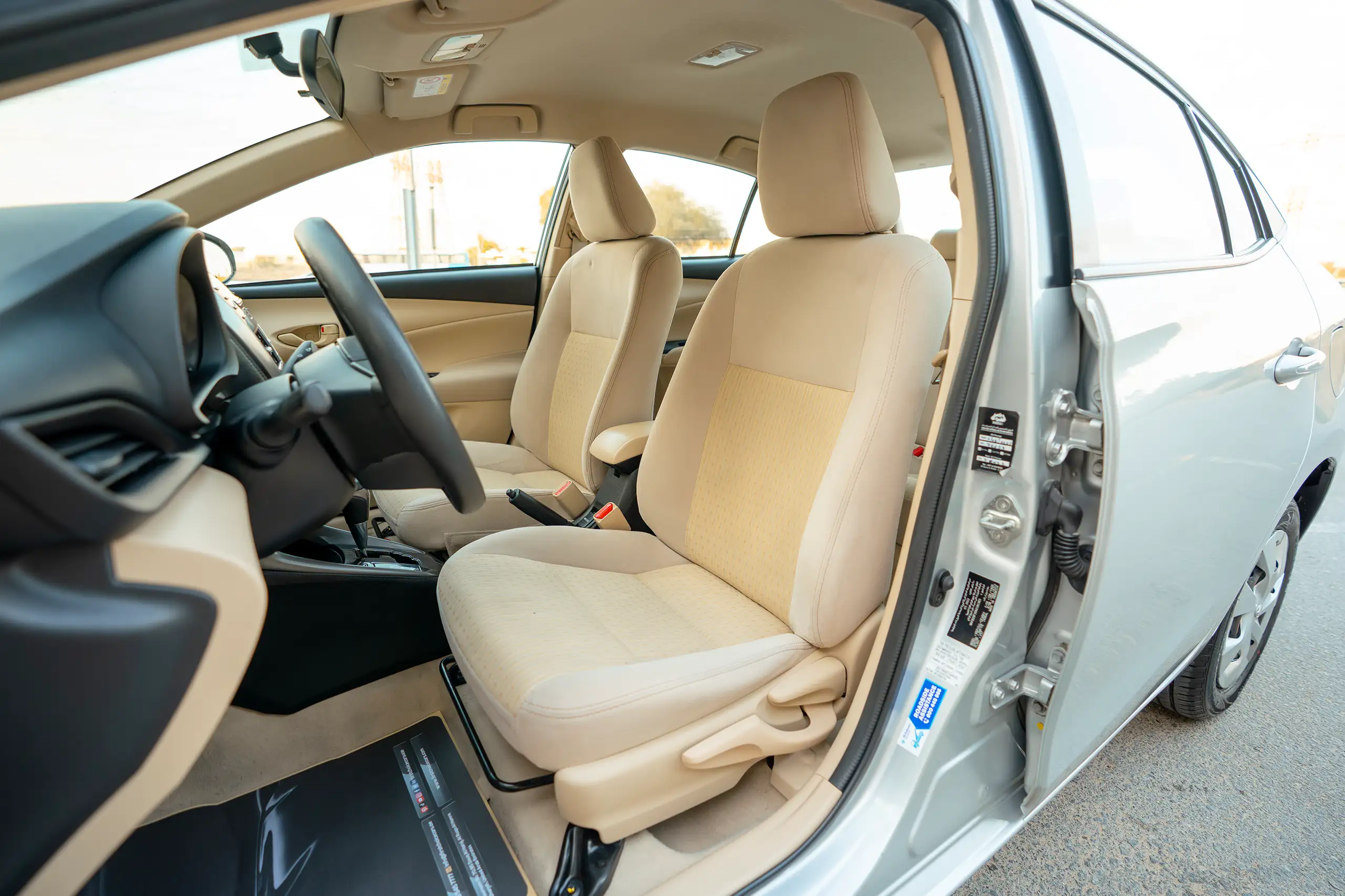 Used 2022 Toyota Yaris E Silver – Front Driver Side Cabin View at First Choice Cars Sharjah