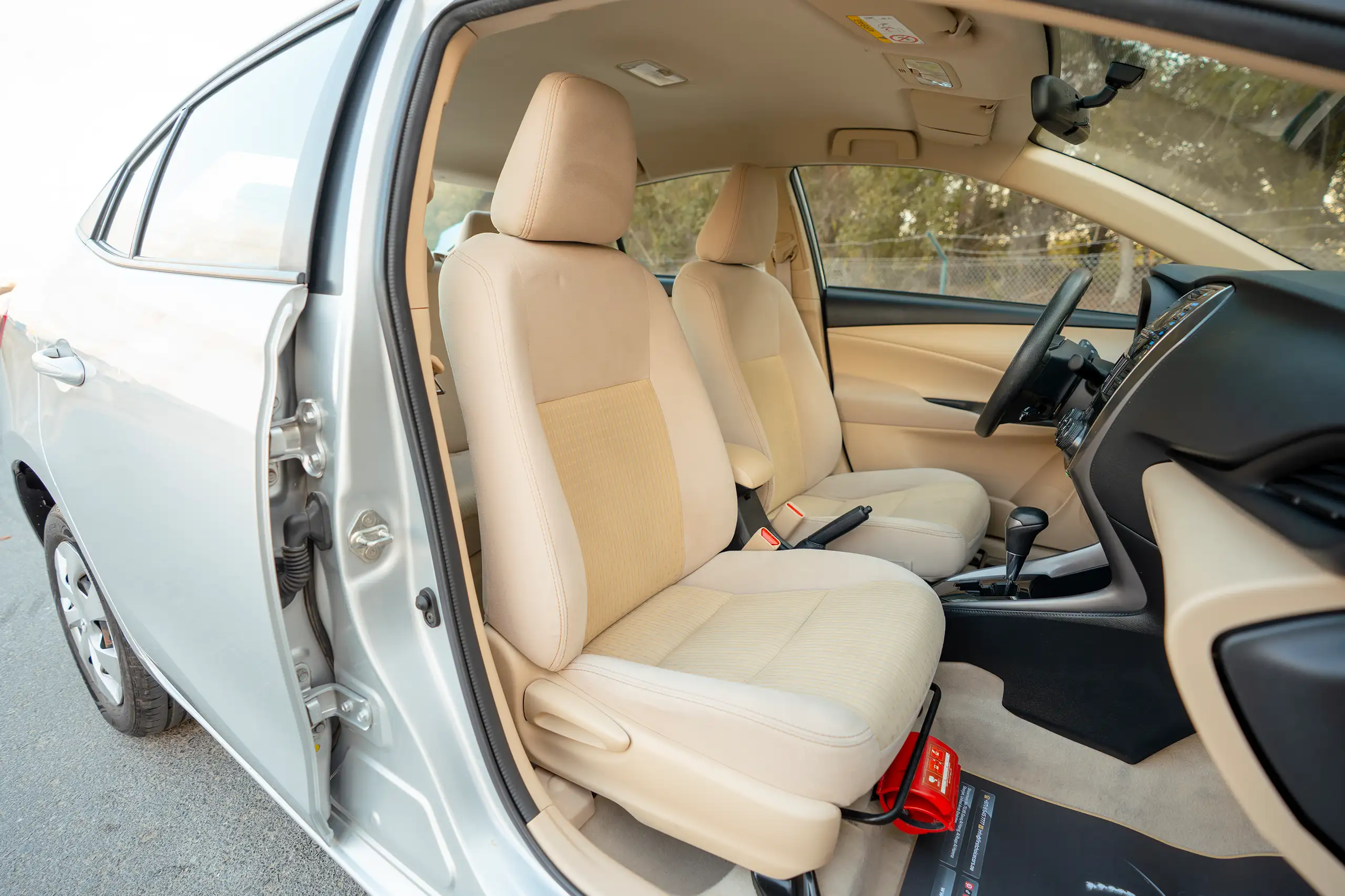 Used 2022 Toyota Yaris E Silver – Front Passenger Side Cabin View at First Choice Cars Sharjah