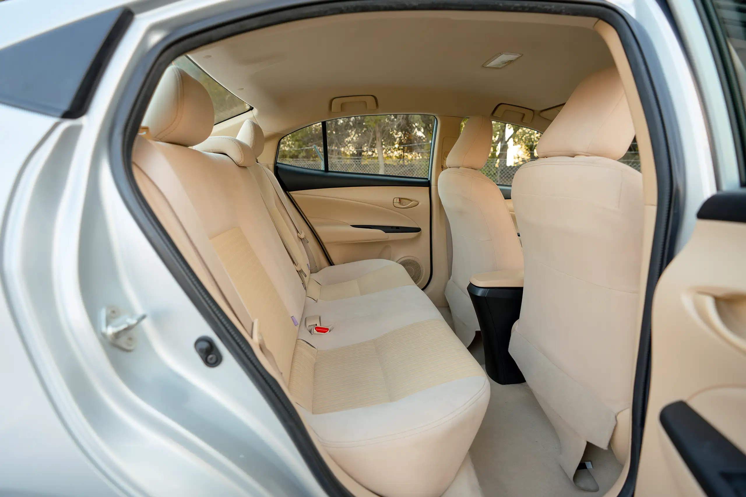 Used 2022 Toyota Yaris E Silver – Rear Passenger Side Cabin View at First Choice Cars Sharjah