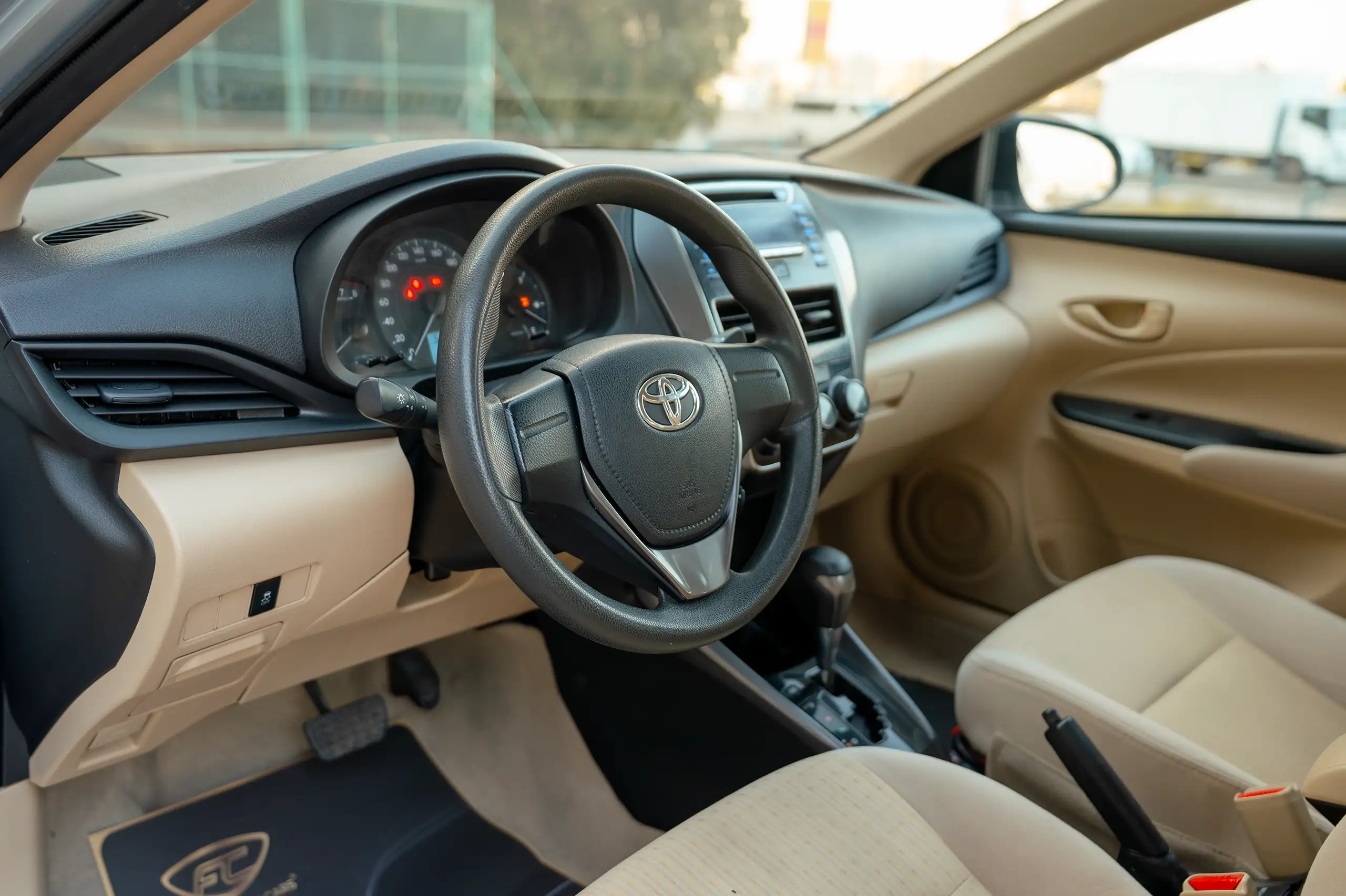 Used 2022 Toyota Yaris E Silver – Driver Side Dashboard & Steering View at First Choice Cars Sharjah