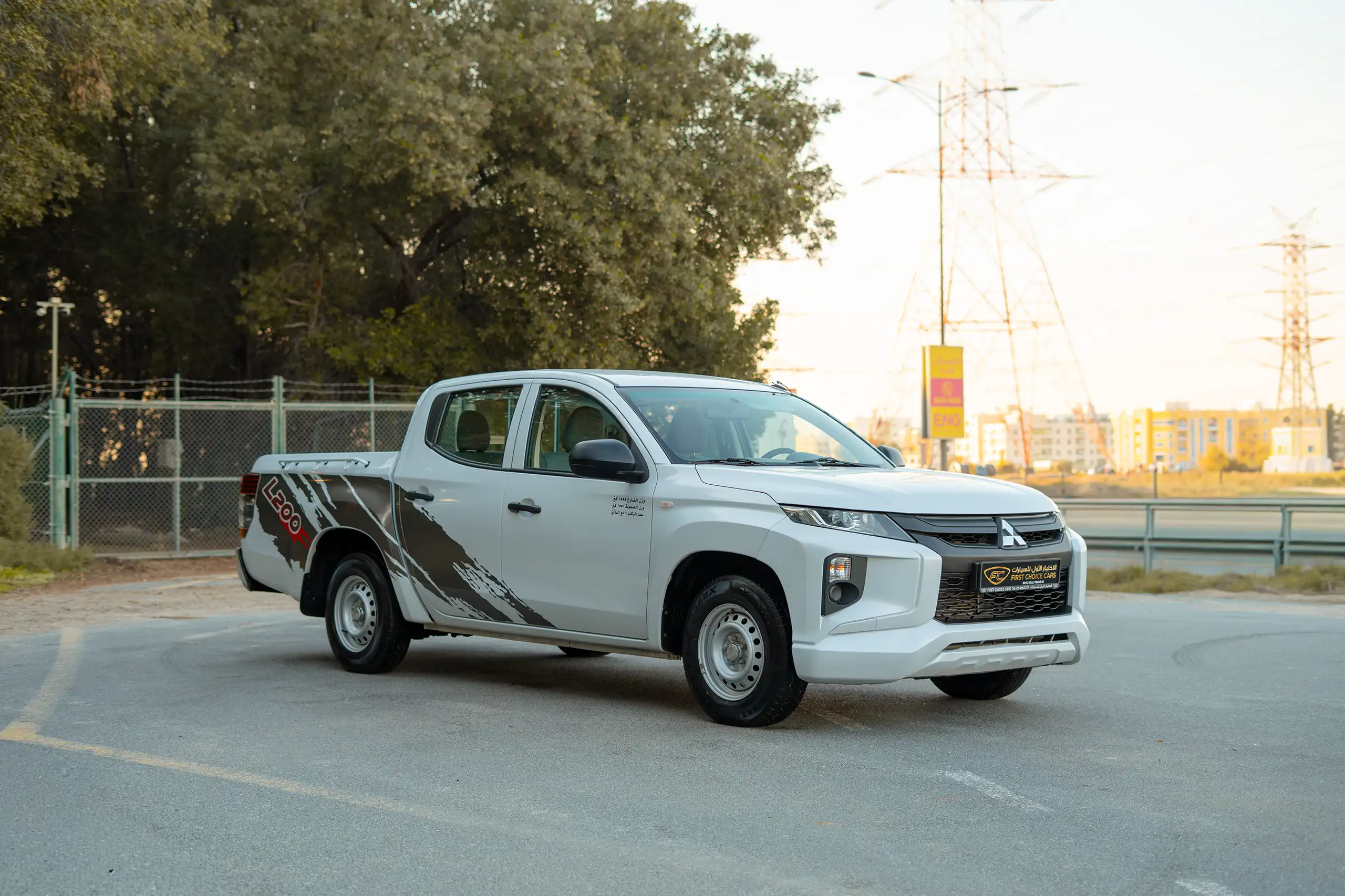 Used 2020 Mitsubishi L200 GL Double Cabin White – Right Front Diagonal (45°) View at First Choice Cars Sharjah