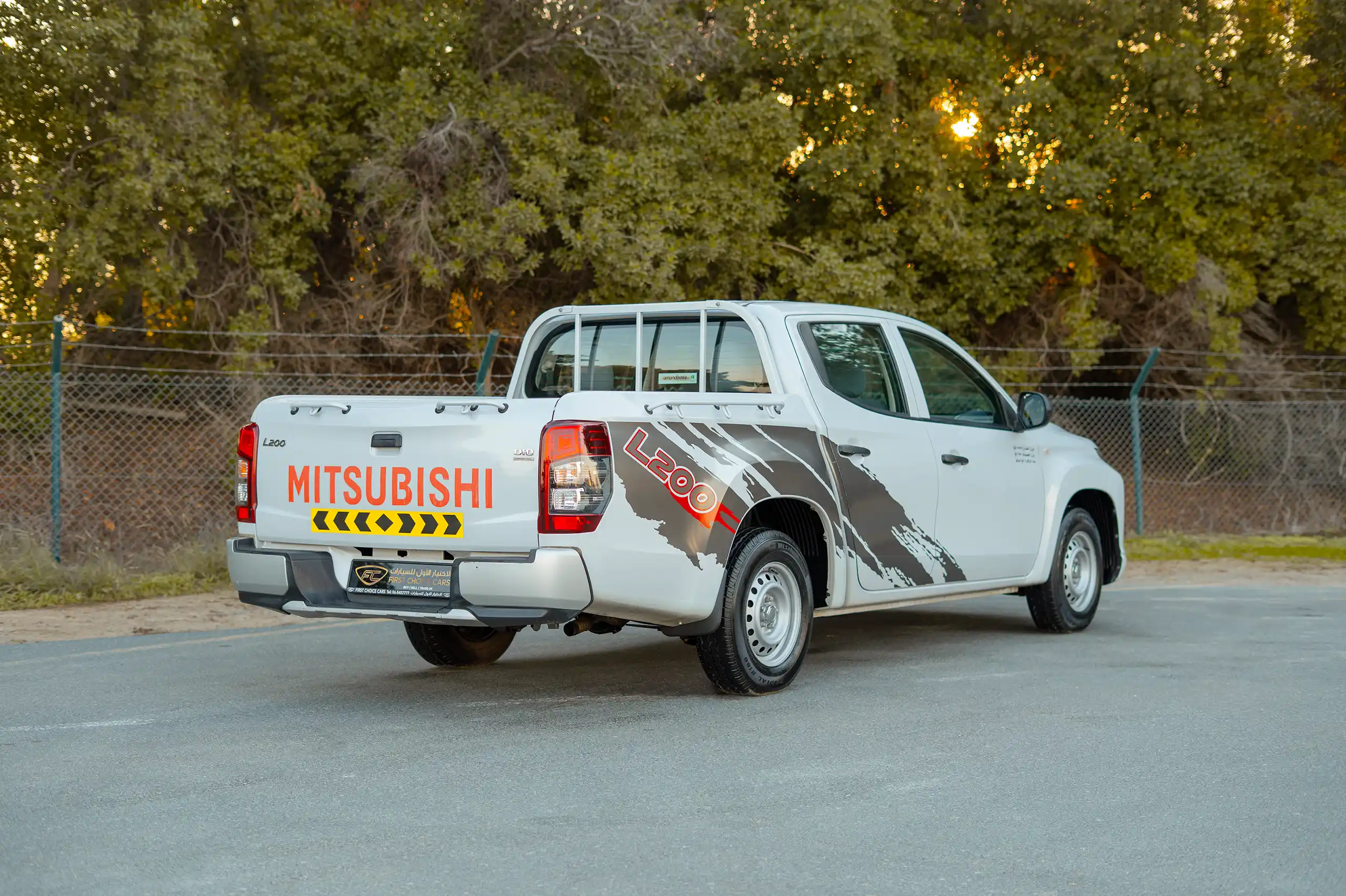 Used 2020 Mitsubishi L200 GL Double Cabin White – Right Back Diagonal (45°) View at First Choice Cars Sharjah