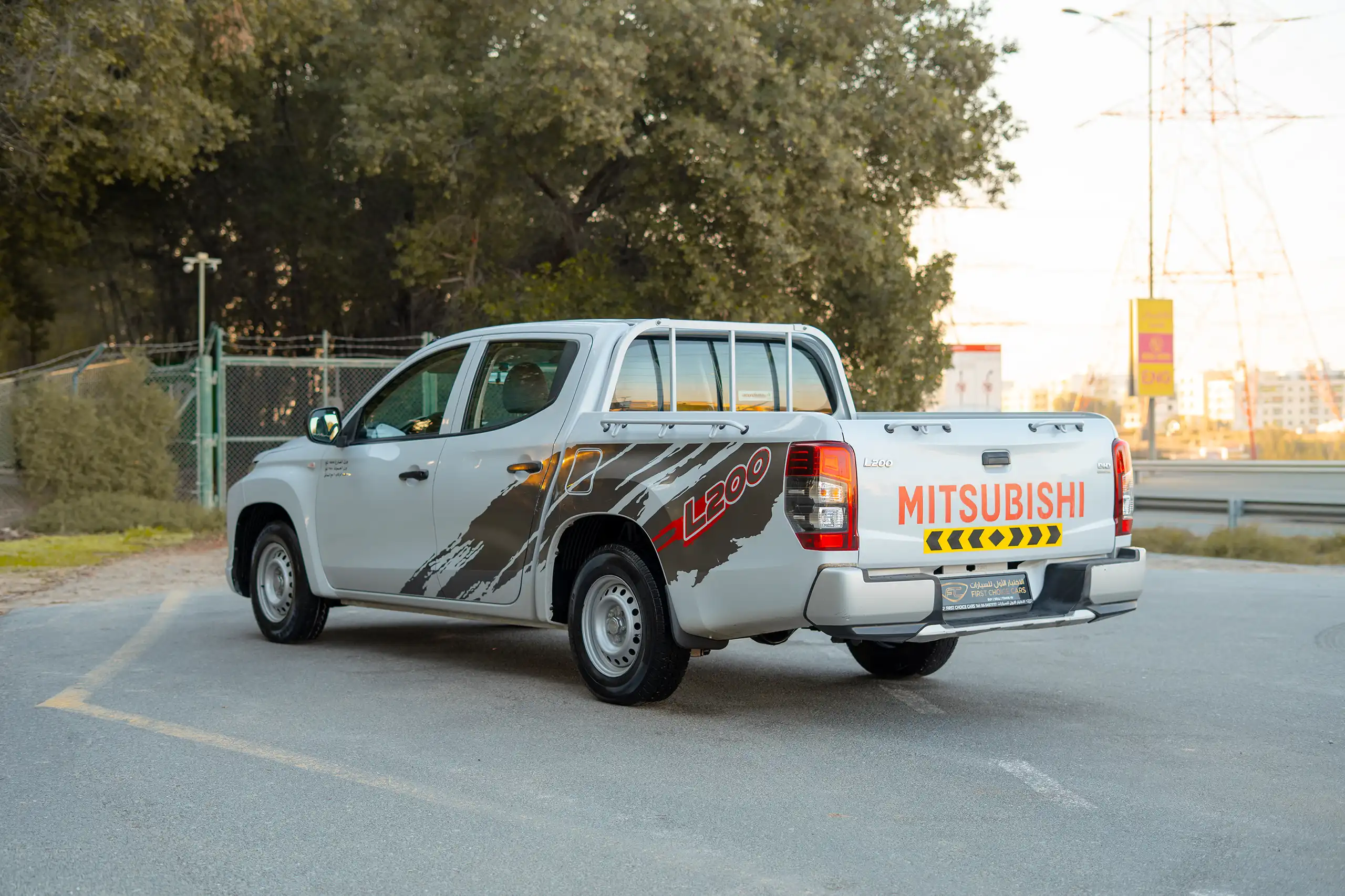 Used 2020 Mitsubishi L200 GL Double Cabin White – Left Back Diagonal (45°) View at First Choice Cars Sharjah