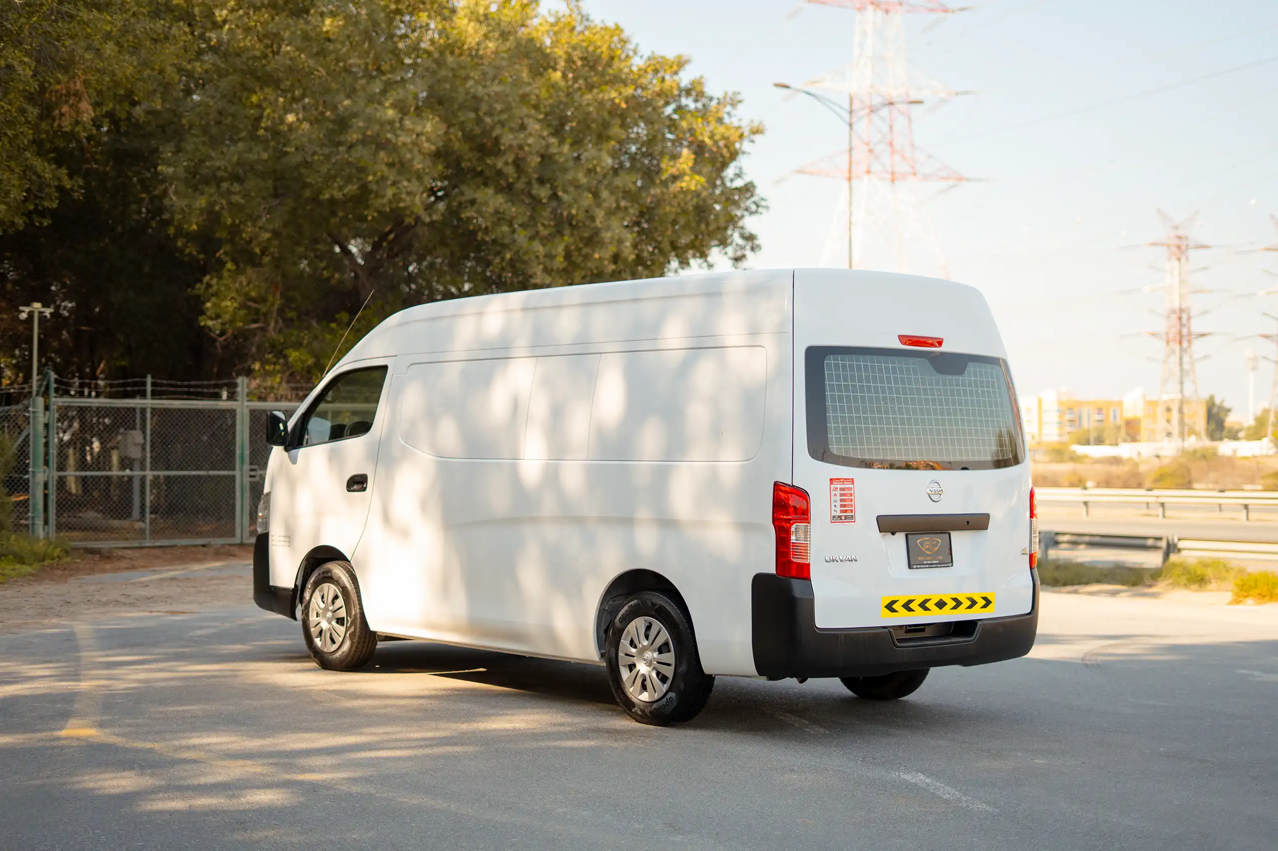 Used 2022 Nissan Urvan High Roof White – Left Back Diagonal (45°) View at First Choice Cars Sharjah