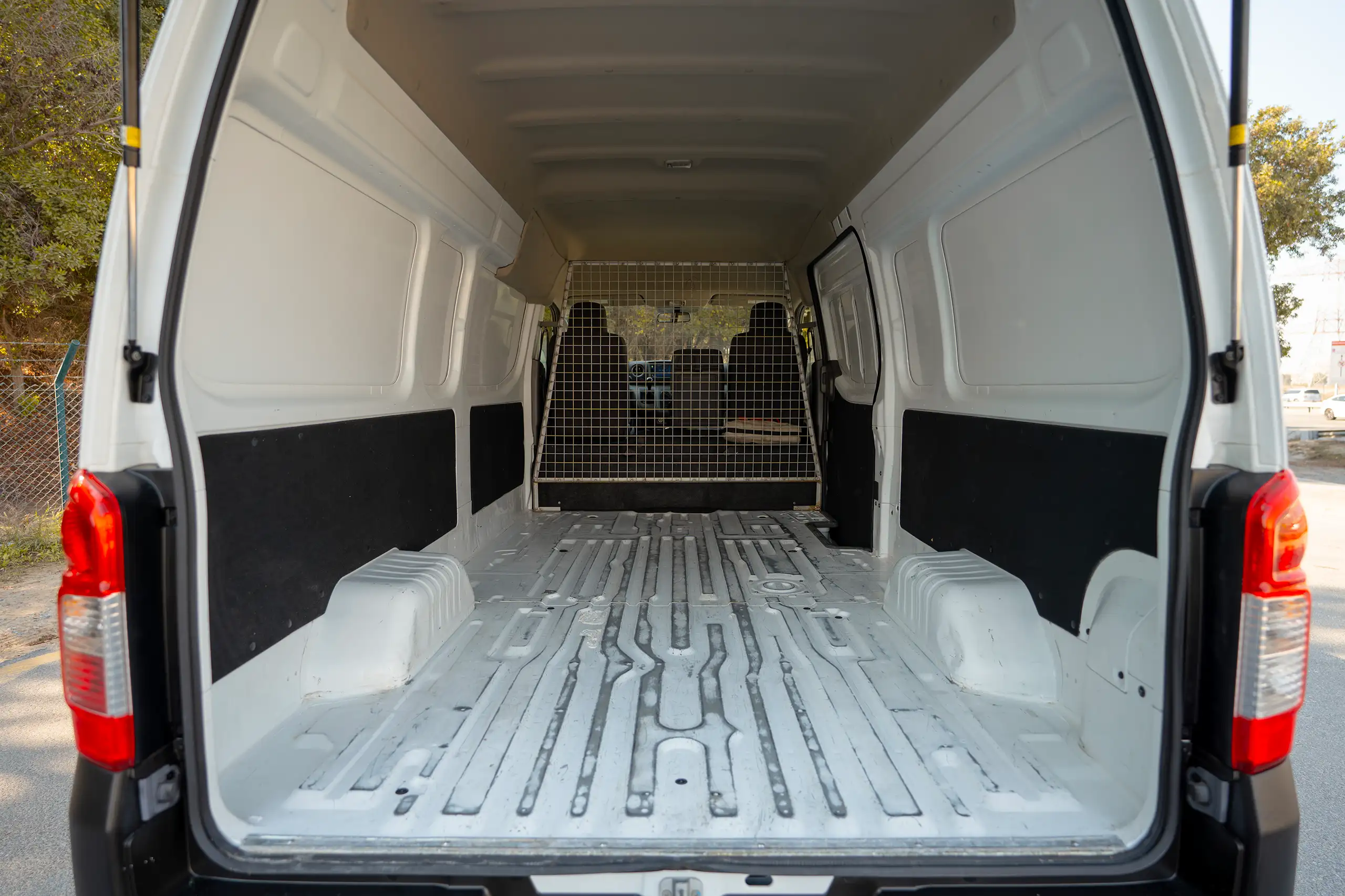 Used 2022 Nissan Urvan High Roof White – Delivery Box Rear Opening View at First Choice Cars Sharjah